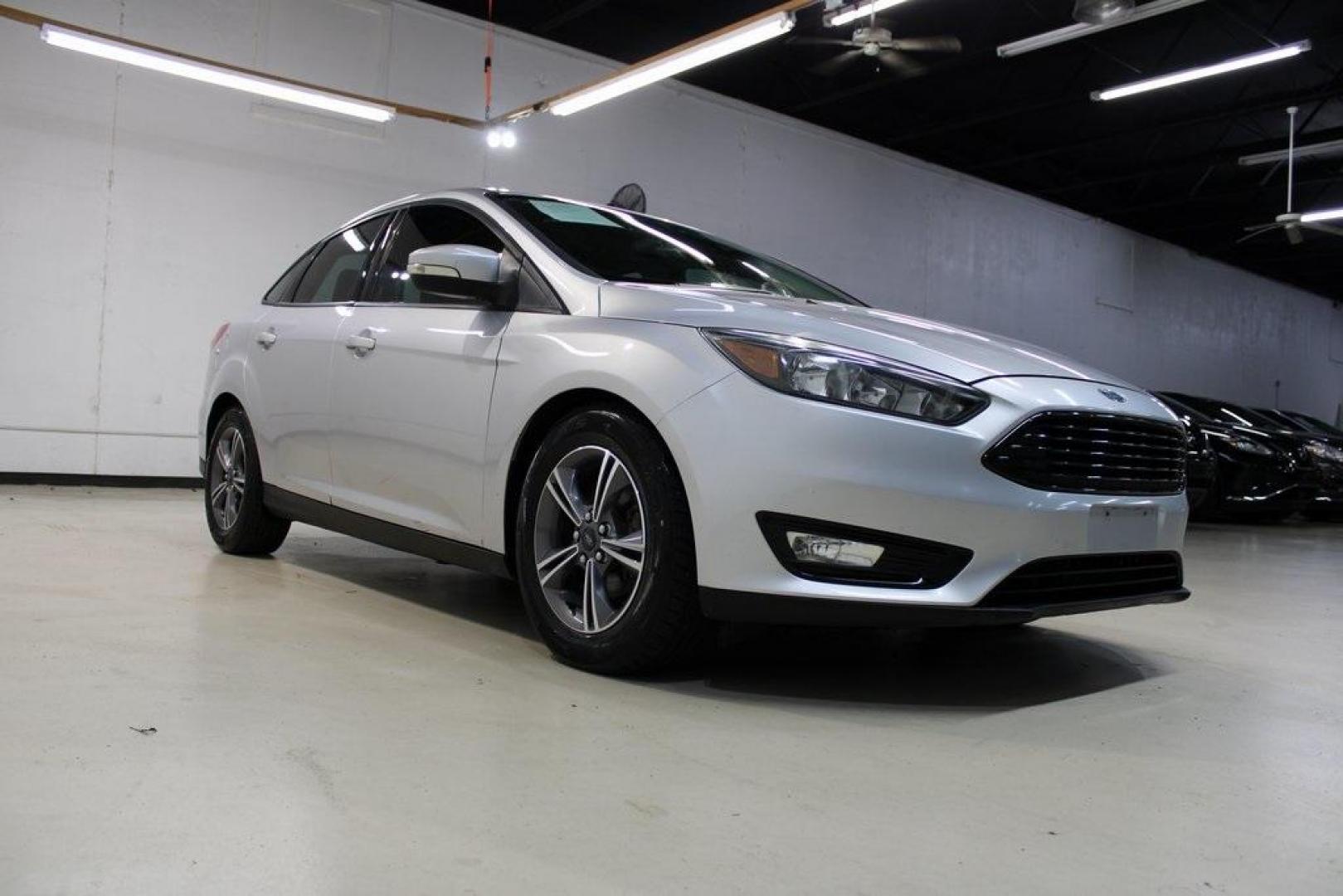 2016 Ingot Silver /Black Ford Focus SE (1FADP3FE5GL) with an EcoBoost 1.0L I3 GTDi DOHC Turbocharged VCT engine, Automatic transmission, located at 15300 Midway Rd., Addison, TX, 75001, (972) 702-0011, 32.958321, -96.838074 - Photo#1