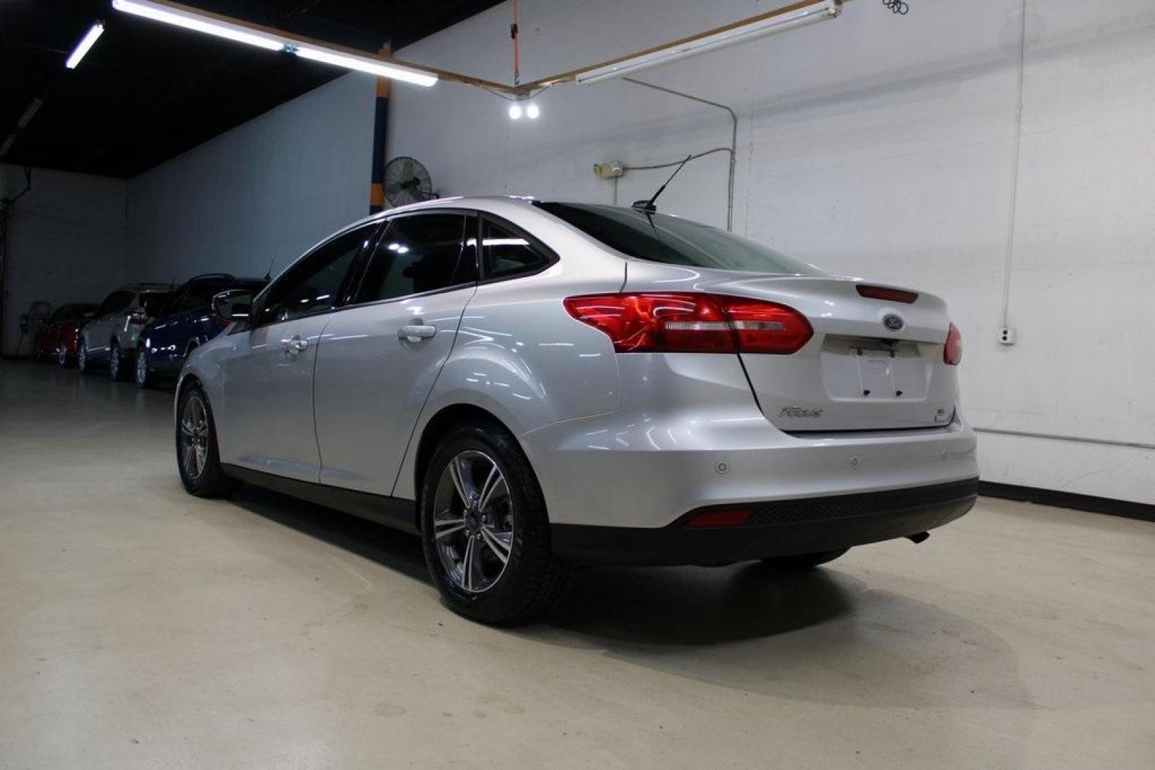 2016 Ingot Silver /Black Ford Focus SE (1FADP3FE5GL) with an EcoBoost 1.0L I3 GTDi DOHC Turbocharged VCT engine, Automatic transmission, located at 15300 Midway Rd., Addison, TX, 75001, (972) 702-0011, 32.958321, -96.838074 - Photo#3