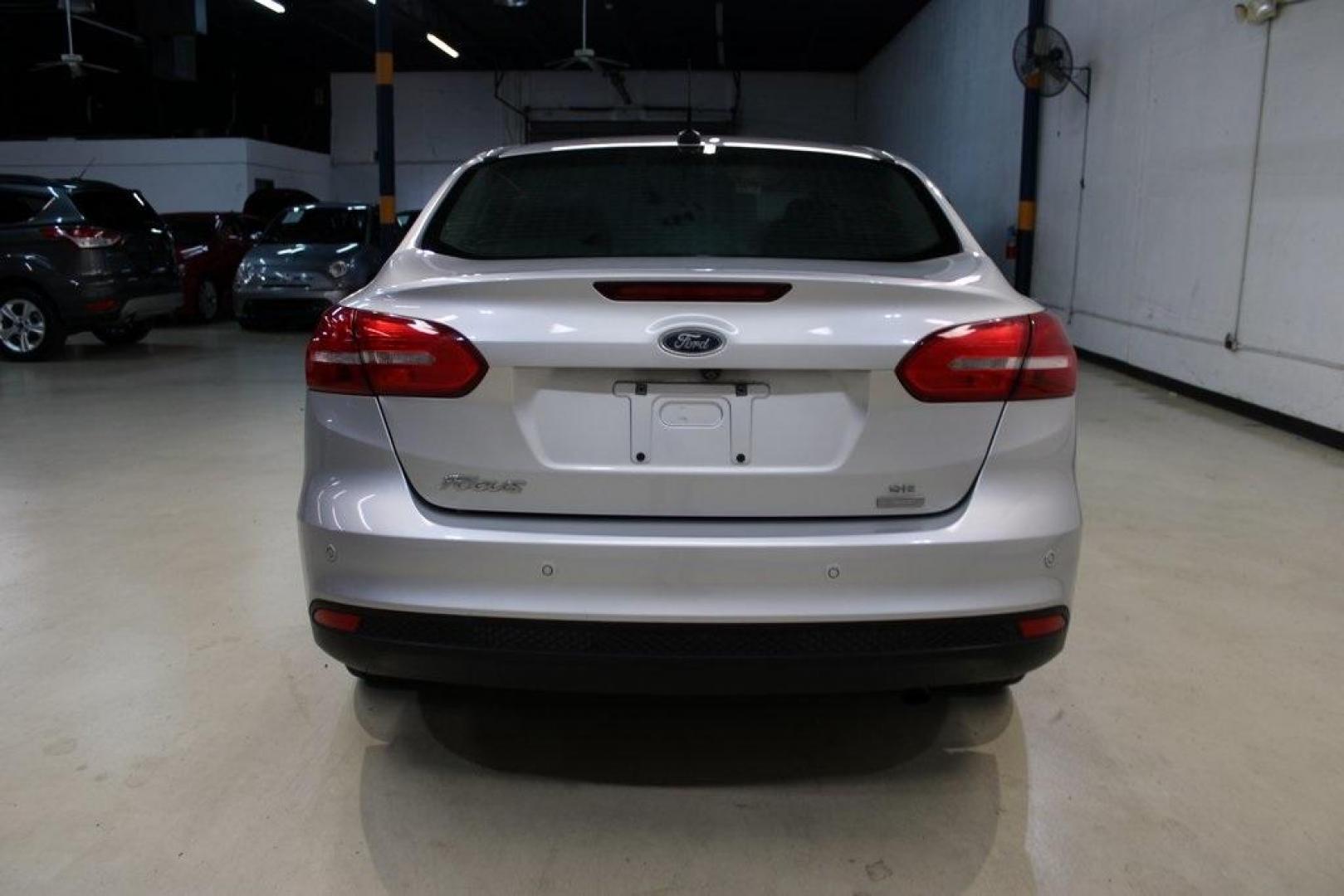 2016 Ingot Silver /Black Ford Focus SE (1FADP3FE5GL) with an EcoBoost 1.0L I3 GTDi DOHC Turbocharged VCT engine, Automatic transmission, located at 15300 Midway Rd., Addison, TX, 75001, (972) 702-0011, 32.958321, -96.838074 - Photo#8