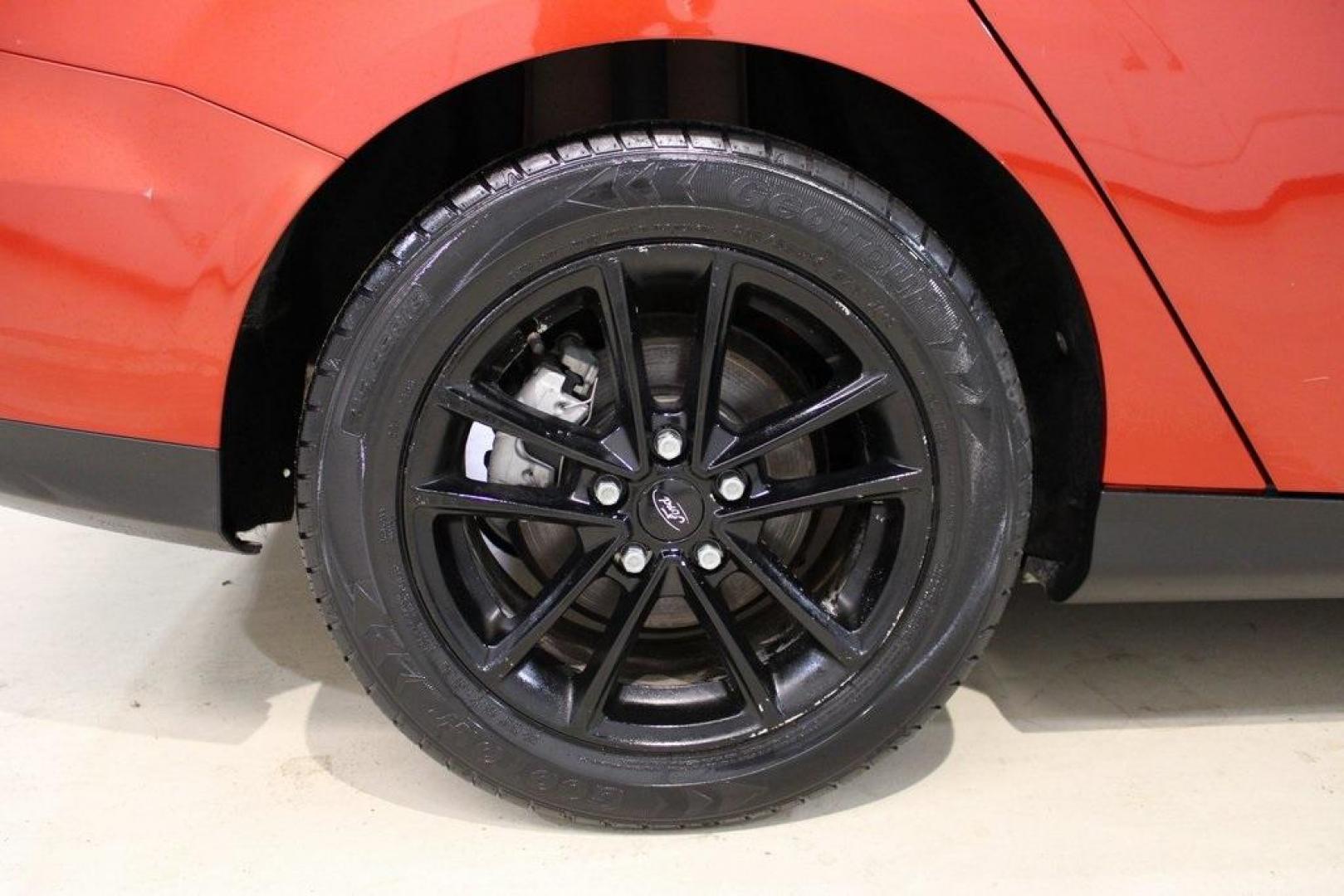 2018 Chili Pepper Red /Charcoal Black Ford Focus SE (1FADP3FE8JL) with an EcoBoost 1.0L I3 GTDi DOHC Turbocharged VCT engine, Automatic transmission, located at 15300 Midway Rd., Addison, TX, 75001, (972) 702-0011, 32.958321, -96.838074 - Photo#10