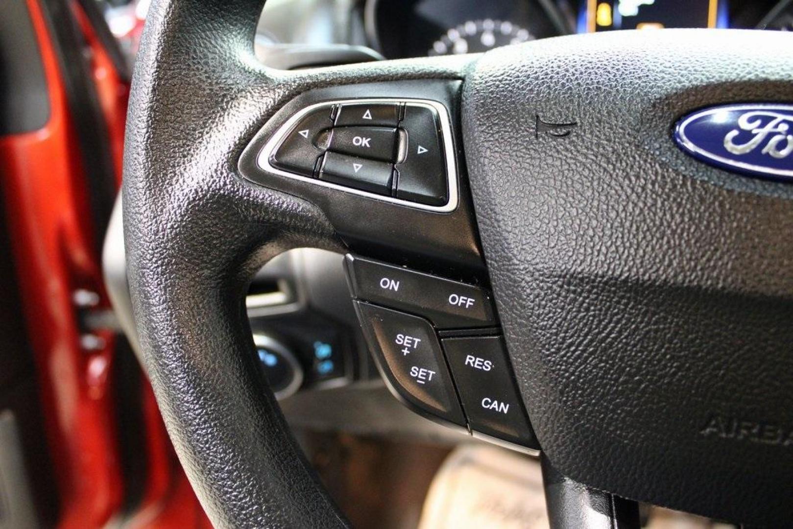 2018 Chili Pepper Red /Charcoal Black Ford Focus SE (1FADP3FE8JL) with an EcoBoost 1.0L I3 GTDi DOHC Turbocharged VCT engine, Automatic transmission, located at 15300 Midway Rd., Addison, TX, 75001, (972) 702-0011, 32.958321, -96.838074 - Photo#23