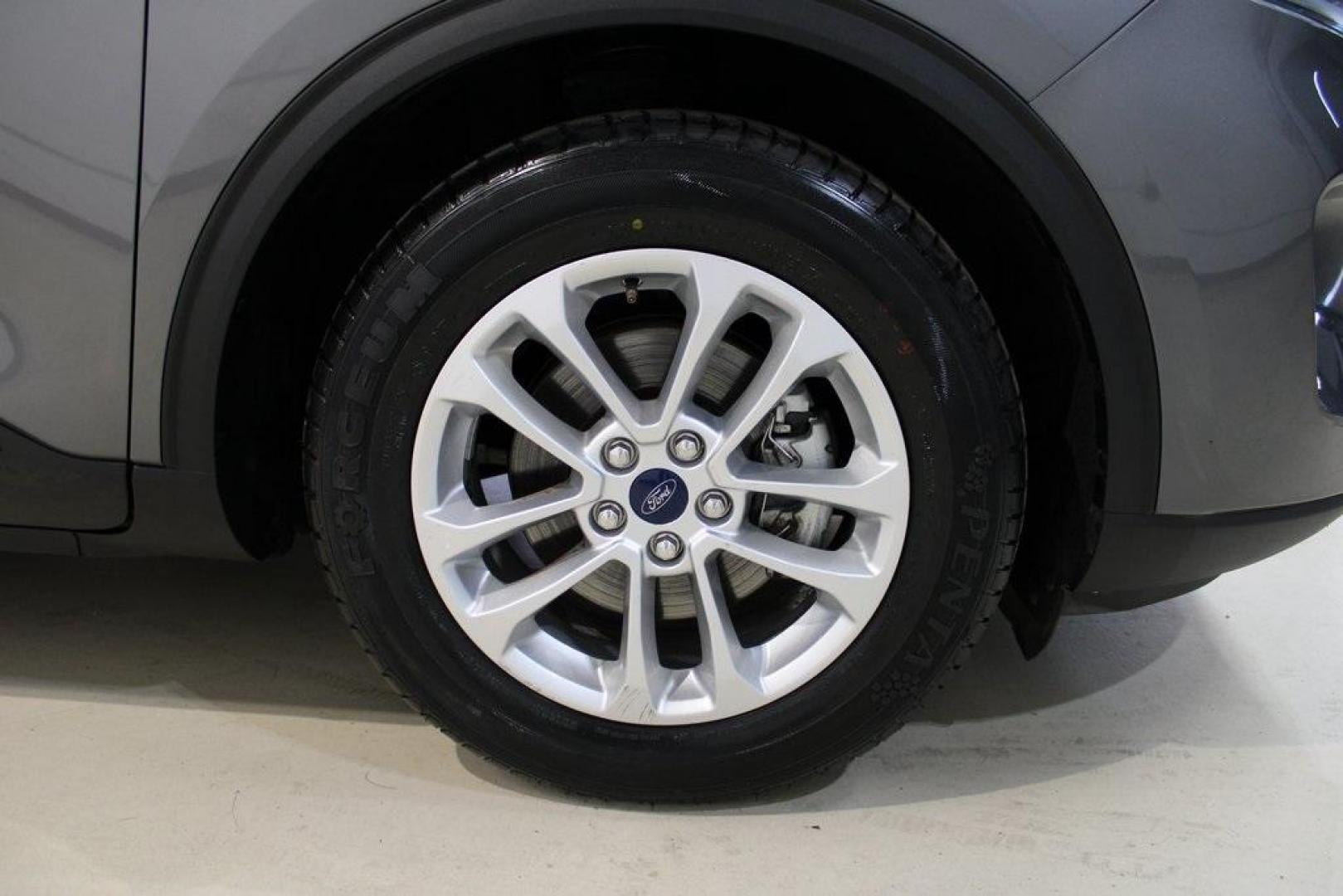 2021 Gray /Ebony Ford Escape S (1FMCU0F63MU) with an 1.5L EcoBoost engine, Automatic transmission, located at 15300 Midway Rd., Addison, TX, 75001, (972) 702-0011, 32.958321, -96.838074 - Photo#11