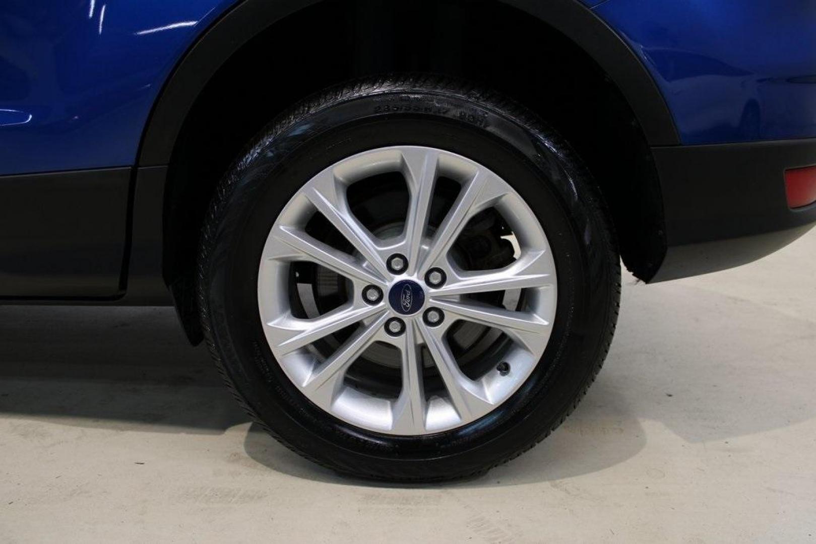 2017 Lightning Blue Metallic /Black Ford Escape SE (1FMCU9GD2HU) with an 1.5L EcoBoost engine, Automatic transmission, located at 15300 Midway Rd., Addison, TX, 75001, (972) 702-0011, 32.958321, -96.838074 - Photo#10