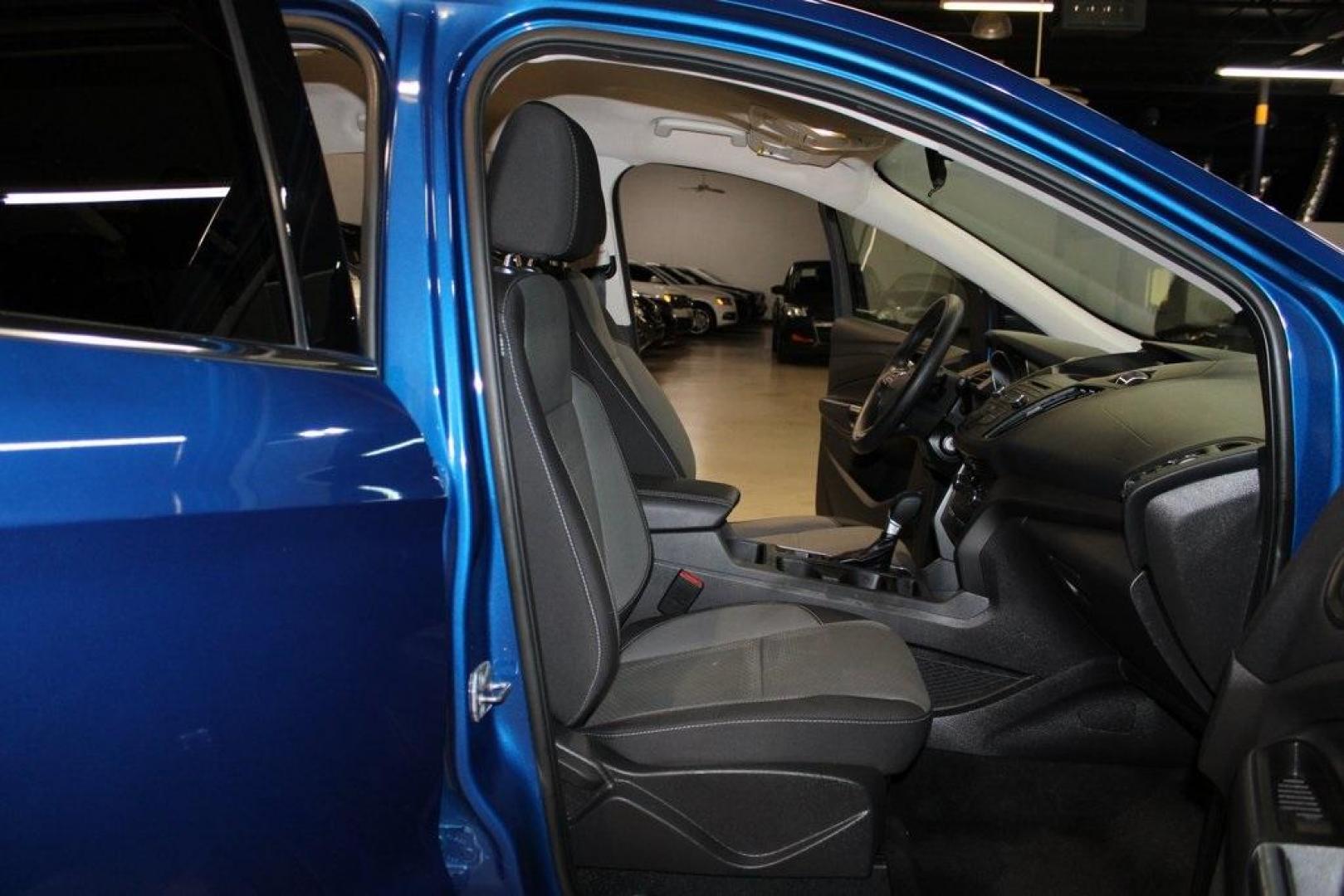 2017 Lightning Blue Metallic /Black Ford Escape SE (1FMCU9GD2HU) with an 1.5L EcoBoost engine, Automatic transmission, located at 15300 Midway Rd., Addison, TX, 75001, (972) 702-0011, 32.958321, -96.838074 - Photo#15