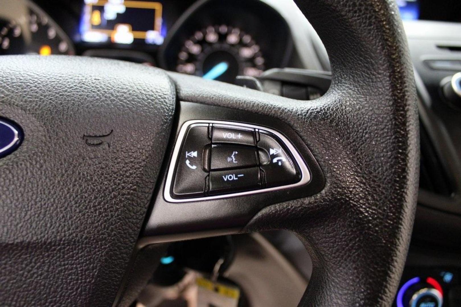 2017 Lightning Blue Metallic /Black Ford Escape SE (1FMCU9GD2HU) with an 1.5L EcoBoost engine, Automatic transmission, located at 15300 Midway Rd., Addison, TX, 75001, (972) 702-0011, 32.958321, -96.838074 - Photo#24