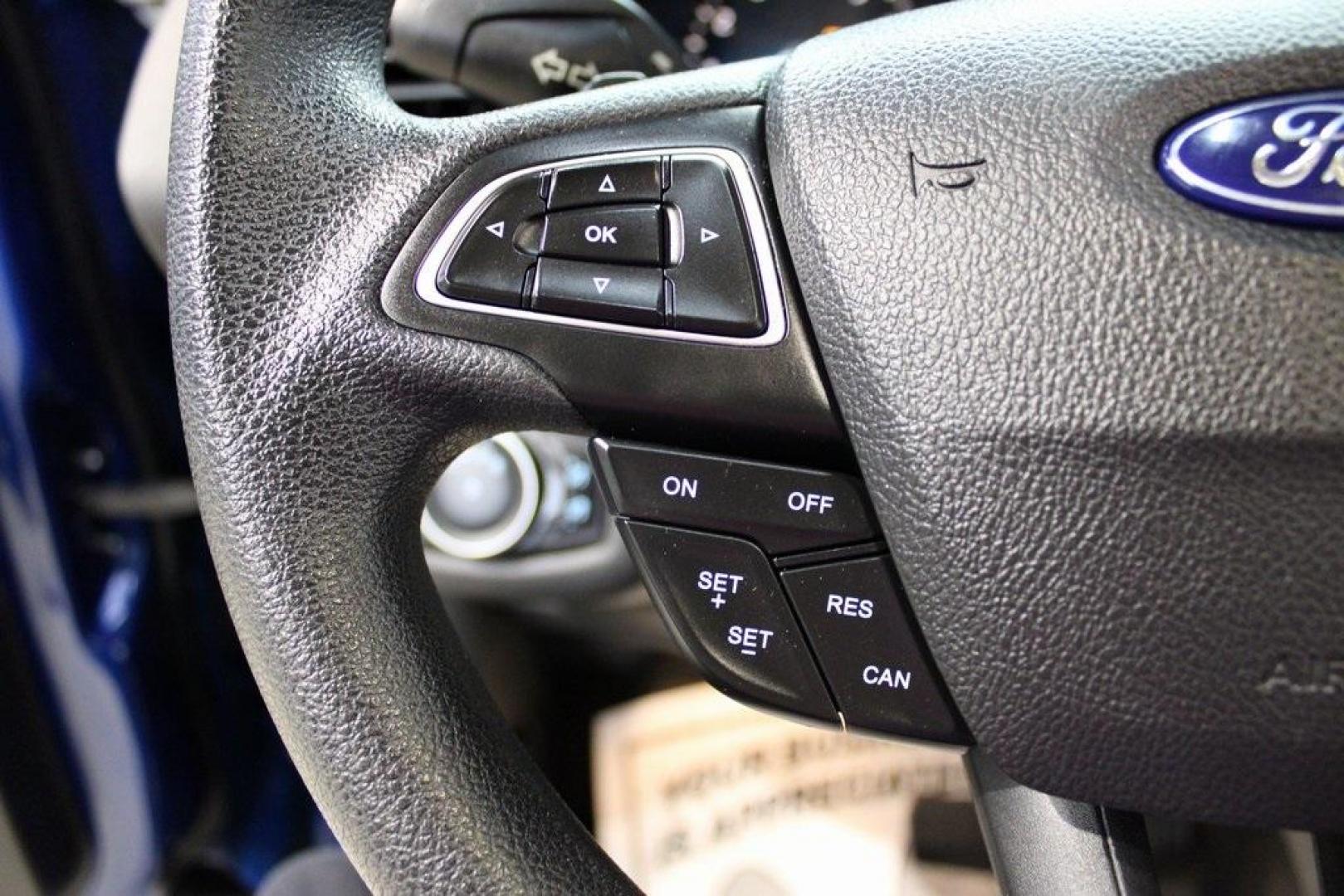 2017 Lightning Blue Metallic /Black Ford Escape SE (1FMCU9GD2HU) with an 1.5L EcoBoost engine, Automatic transmission, located at 15300 Midway Rd., Addison, TX, 75001, (972) 702-0011, 32.958321, -96.838074 - Photo#25