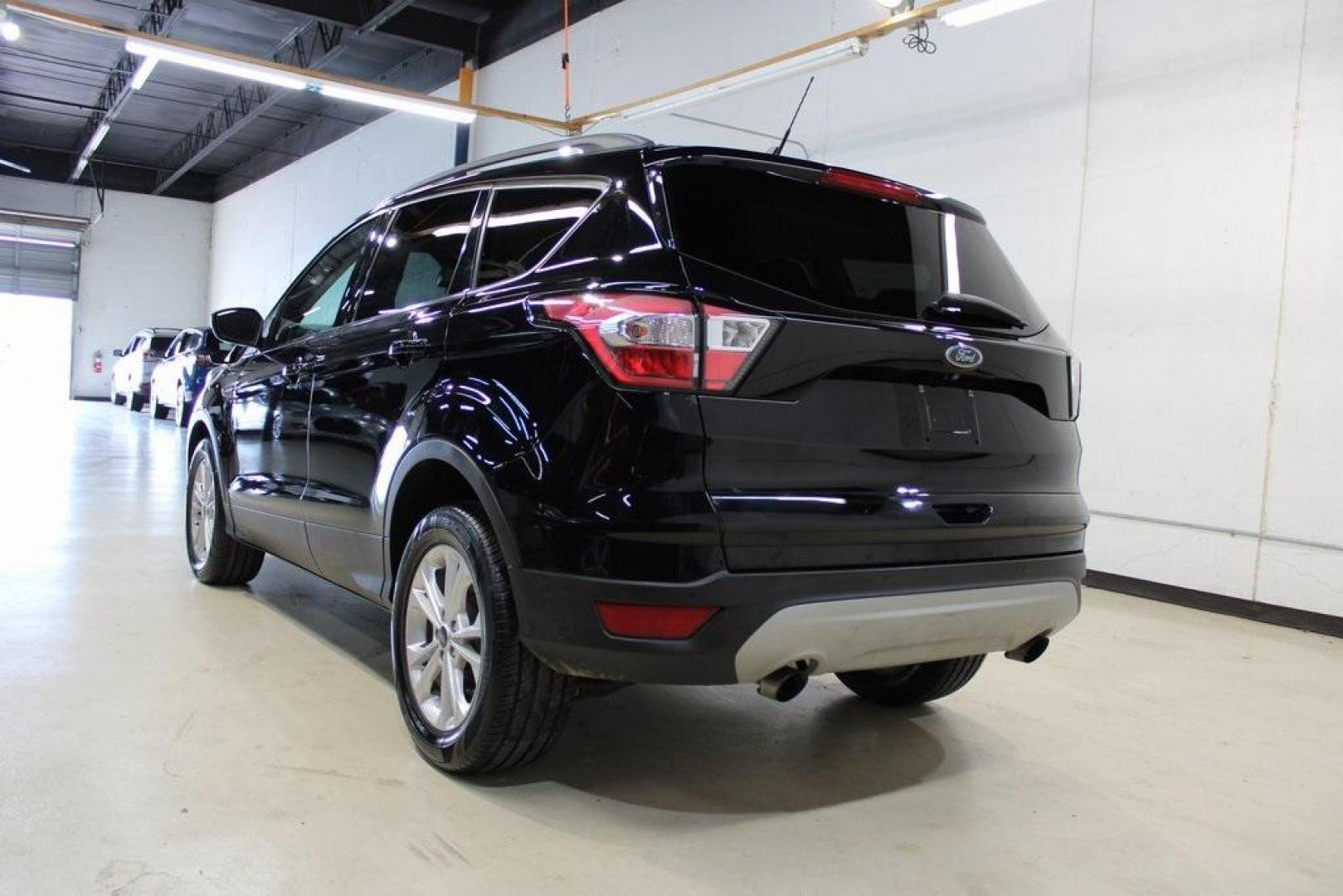 2018 Shadow Black /Medium Light Stone Ford Escape SE (1FMCU0GD3JU) with an EcoBoost 2.0L I4 GTDi DOHC Turbocharged VCT engine, Automatic transmission, located at 15300 Midway Rd., Addison, TX, 75001, (972) 702-0011, 32.958321, -96.838074 - Photo#3