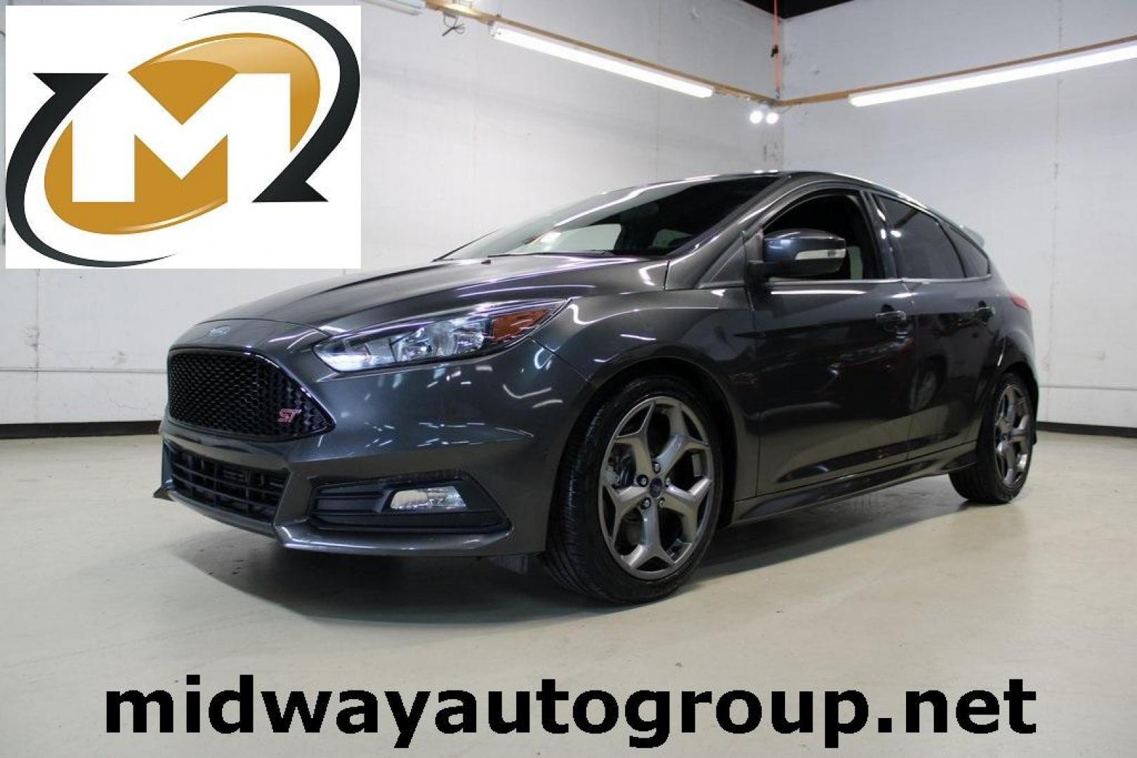 2017 Magnetic /Black Ford Focus ST (1FADP3L94HL) with an 2.0L GTDi engine, Manual transmission, located at 15300 Midway Rd., Addison, TX, 75001, (972) 702-0011, 32.958321, -96.838074 - Photo#0