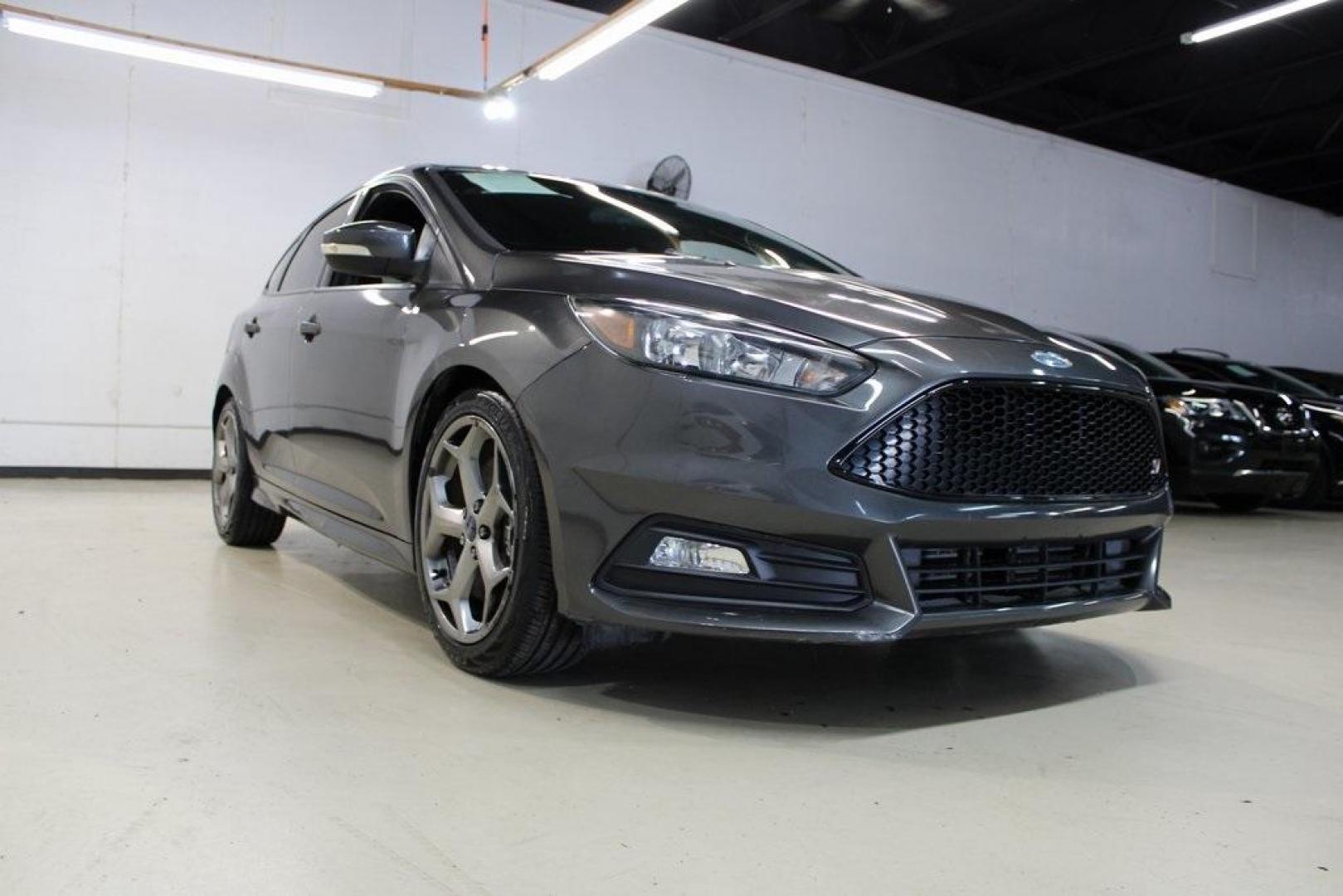 2017 Magnetic /Black Ford Focus ST (1FADP3L94HL) with an 2.0L GTDi engine, Manual transmission, located at 15300 Midway Rd., Addison, TX, 75001, (972) 702-0011, 32.958321, -96.838074 - Photo#1