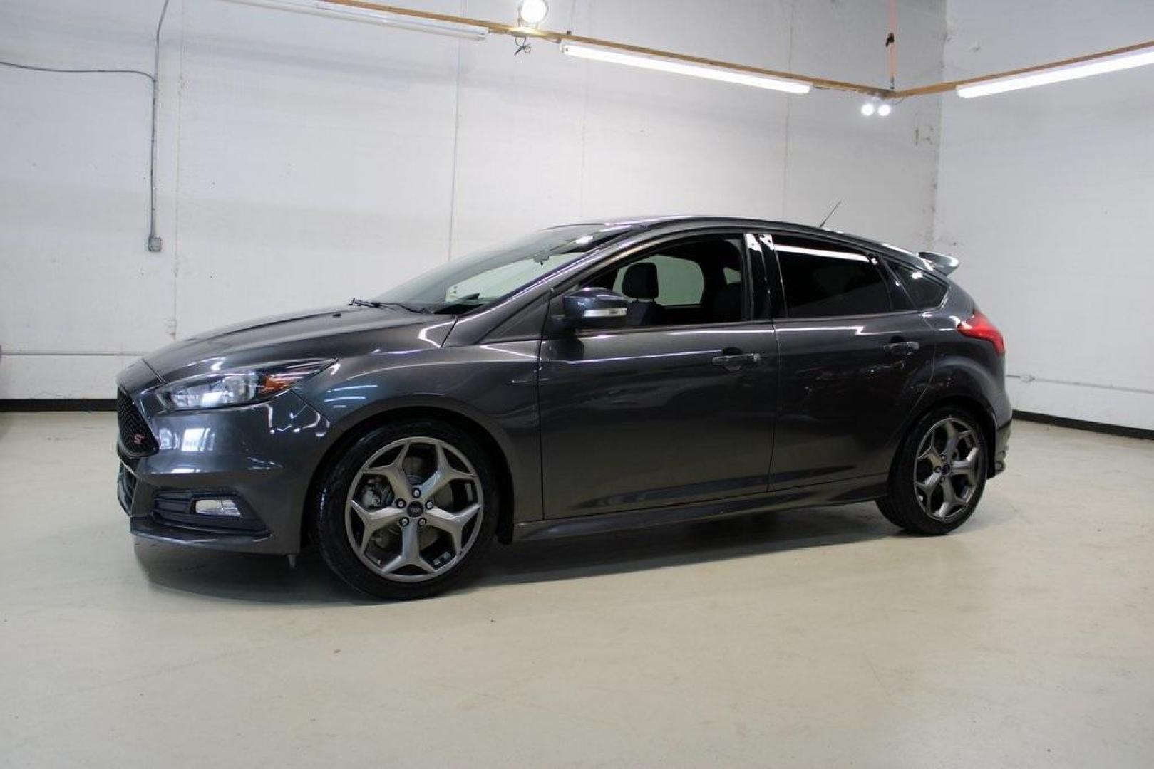 2017 Magnetic /Black Ford Focus ST (1FADP3L94HL) with an 2.0L GTDi engine, Manual transmission, located at 15300 Midway Rd., Addison, TX, 75001, (972) 702-0011, 32.958321, -96.838074 - Photo#4
