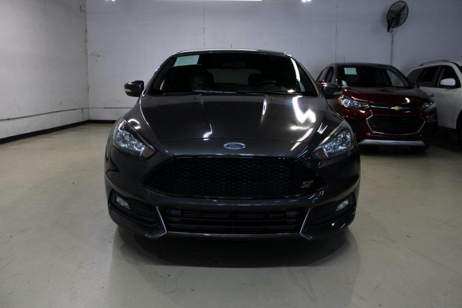 2017 Magnetic /Black Ford Focus ST (1FADP3L94HL) with an 2.0L GTDi engine, Manual transmission, located at 15300 Midway Rd., Addison, TX, 75001, (972) 702-0011, 32.958321, -96.838074 - Photo#5