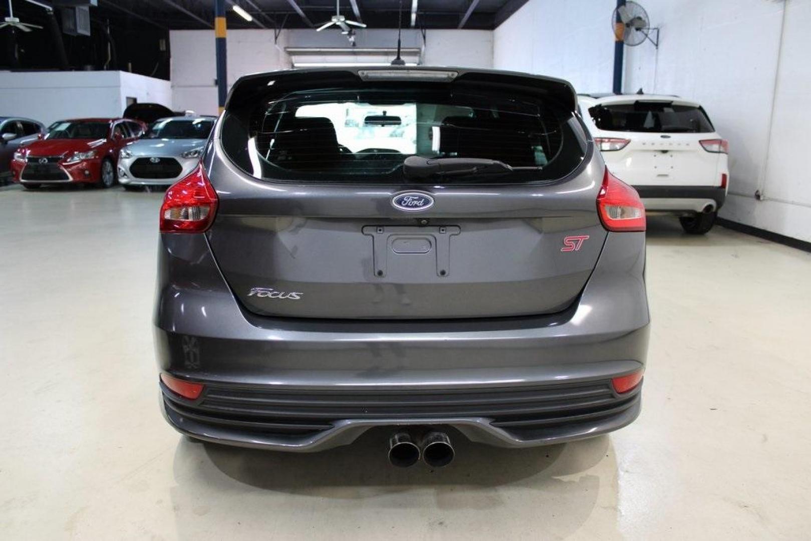 2017 Magnetic /Black Ford Focus ST (1FADP3L94HL) with an 2.0L GTDi engine, Manual transmission, located at 15300 Midway Rd., Addison, TX, 75001, (972) 702-0011, 32.958321, -96.838074 - Photo#7