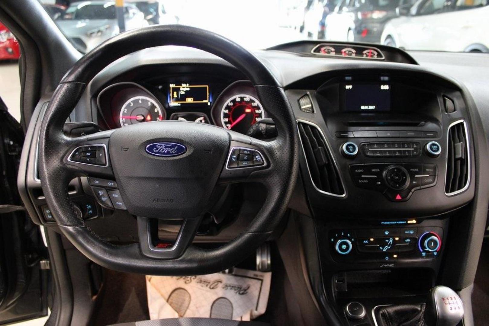 2017 Magnetic /Black Ford Focus ST (1FADP3L94HL) with an 2.0L GTDi engine, Manual transmission, located at 15300 Midway Rd., Addison, TX, 75001, (972) 702-0011, 32.958321, -96.838074 - Photo#17