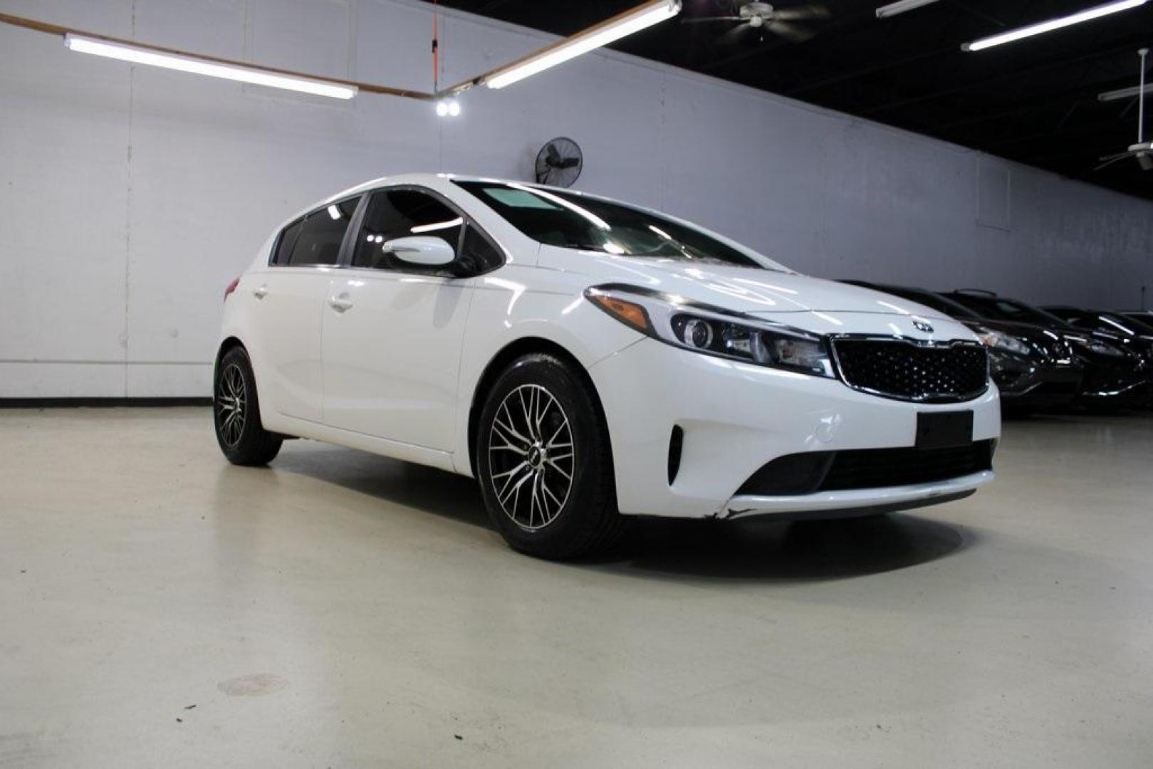 2017 Clear White /Black Kia Forte5 LX (KNAFK5A83H5) with an 2.0L I4 DOHC Dual CVVT engine, Automatic transmission, located at 15300 Midway Rd., Addison, TX, 75001, (972) 702-0011, 32.958321, -96.838074 - Photo#1