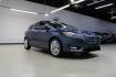 2018 Blue Metallic /Charcoal Black Ford Focus Titanium (1FADP3N28JL) with an 2.0L I4 DGI Ti-VCT engine, Automatic transmission, located at 15300 Midway Rd., Addison, TX, 75001, (972) 702-0011, 32.958321, -96.838074 - Photo#1