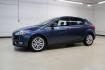 2018 Blue Metallic /Charcoal Black Ford Focus Titanium (1FADP3N28JL) with an 2.0L I4 DGI Ti-VCT engine, Automatic transmission, located at 15300 Midway Rd., Addison, TX, 75001, (972) 702-0011, 32.958321, -96.838074 - Photo#4