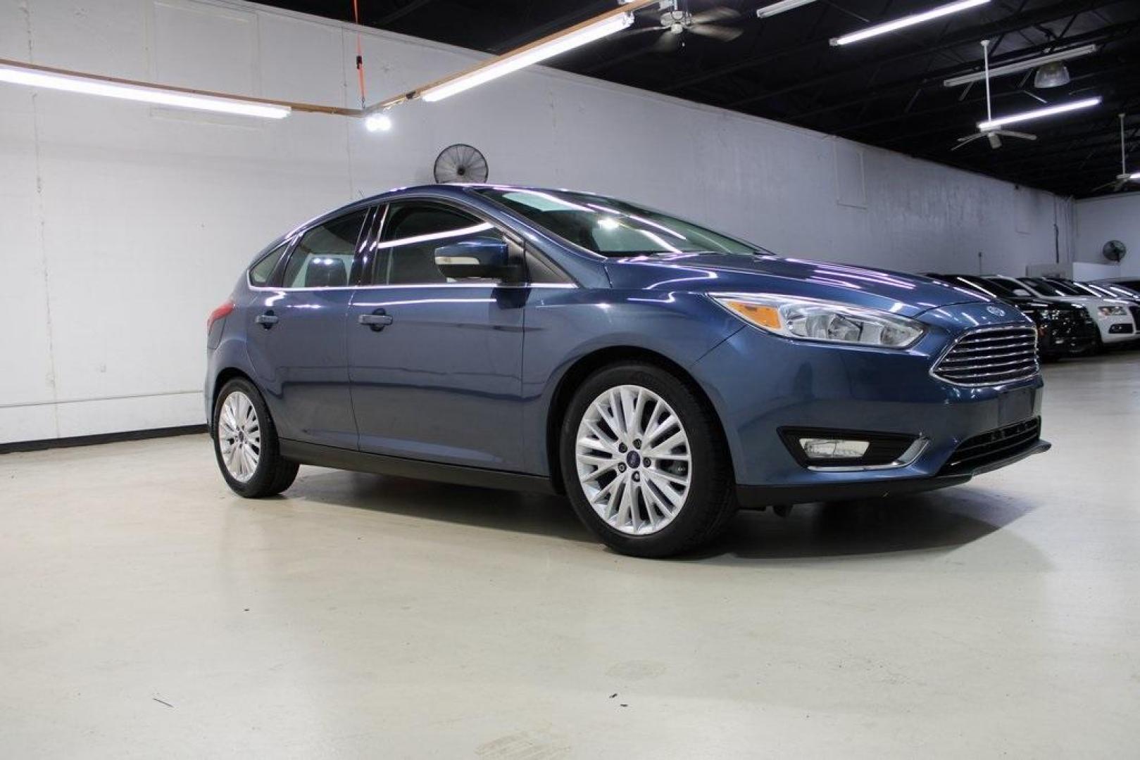 2018 Blue Metallic /Charcoal Black Ford Focus Titanium (1FADP3N28JL) with an 2.0L I4 DGI Ti-VCT engine, Automatic transmission, located at 15300 Midway Rd., Addison, TX, 75001, (972) 702-0011, 32.958321, -96.838074 - Photo#6
