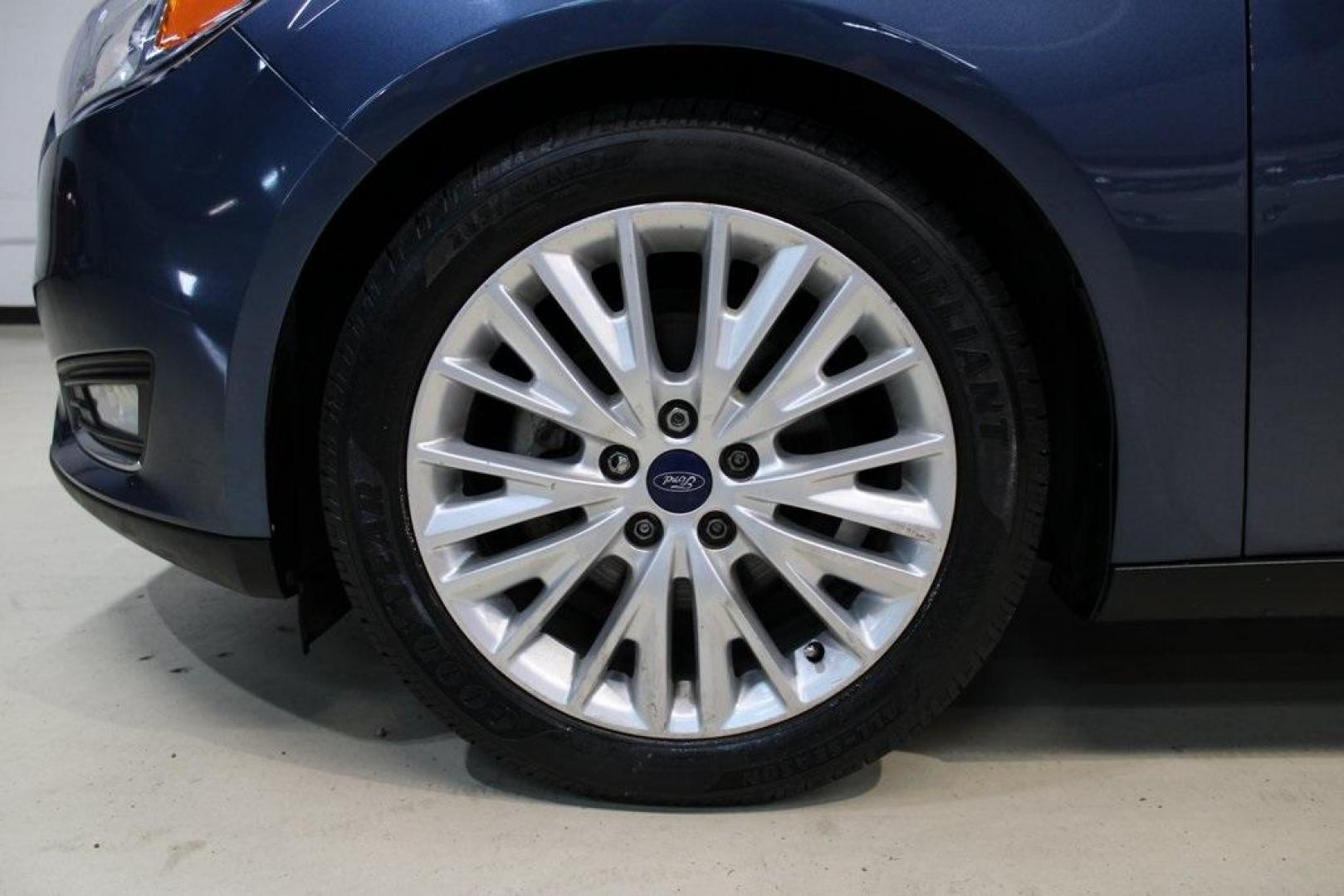 2018 Blue Metallic /Charcoal Black Ford Focus Titanium (1FADP3N28JL) with an 2.0L I4 DGI Ti-VCT engine, Automatic transmission, located at 15300 Midway Rd., Addison, TX, 75001, (972) 702-0011, 32.958321, -96.838074 - Photo#8