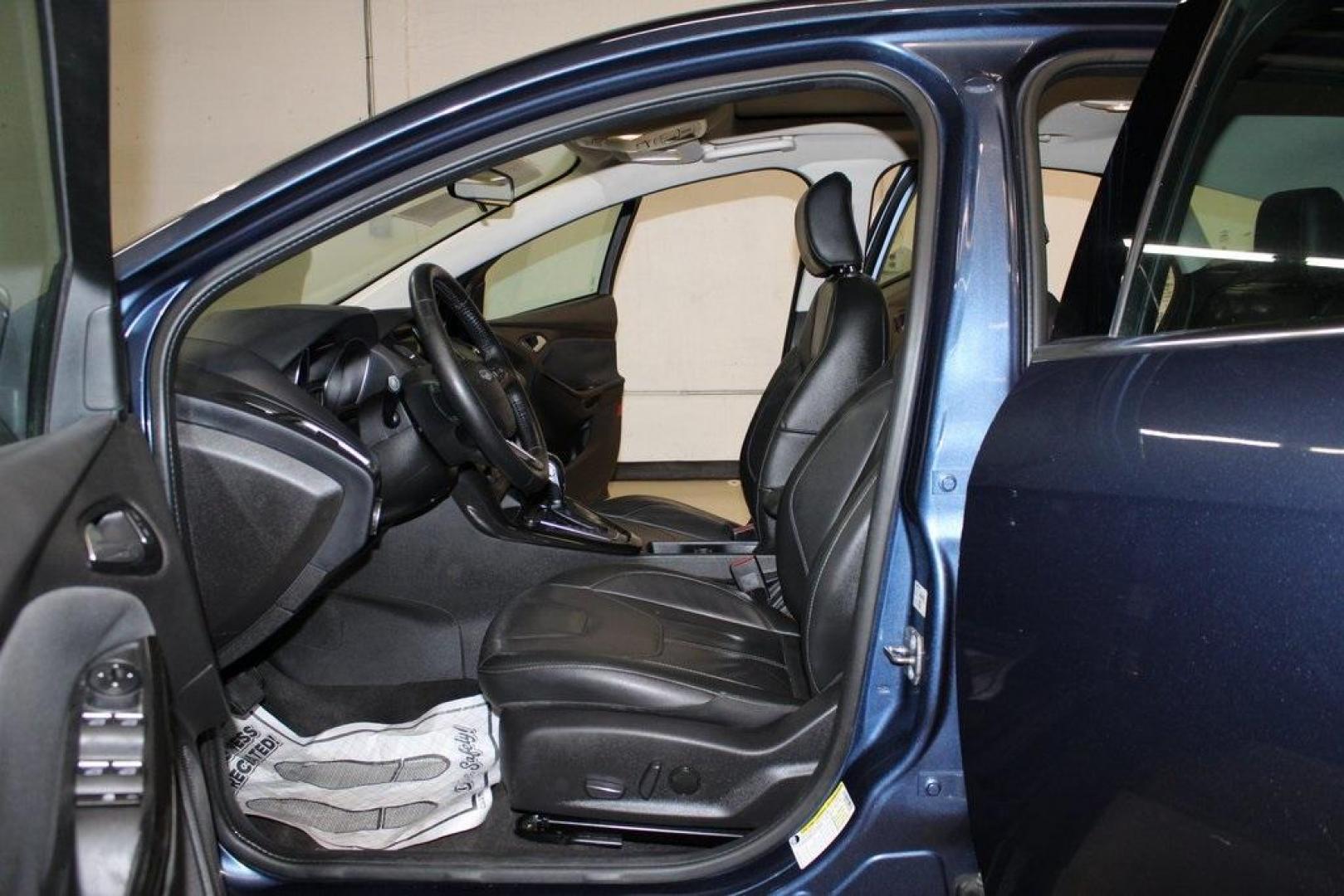 2018 Blue Metallic /Charcoal Black Ford Focus Titanium (1FADP3N28JL) with an 2.0L I4 DGI Ti-VCT engine, Automatic transmission, located at 15300 Midway Rd., Addison, TX, 75001, (972) 702-0011, 32.958321, -96.838074 - Photo#13