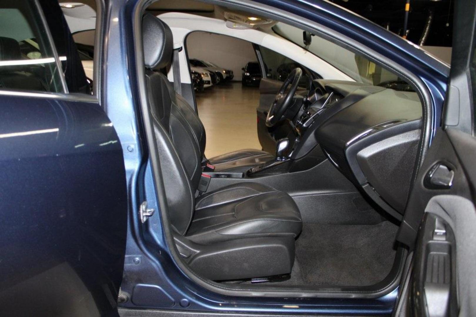2018 Blue Metallic /Charcoal Black Ford Focus Titanium (1FADP3N28JL) with an 2.0L I4 DGI Ti-VCT engine, Automatic transmission, located at 15300 Midway Rd., Addison, TX, 75001, (972) 702-0011, 32.958321, -96.838074 - Photo#14