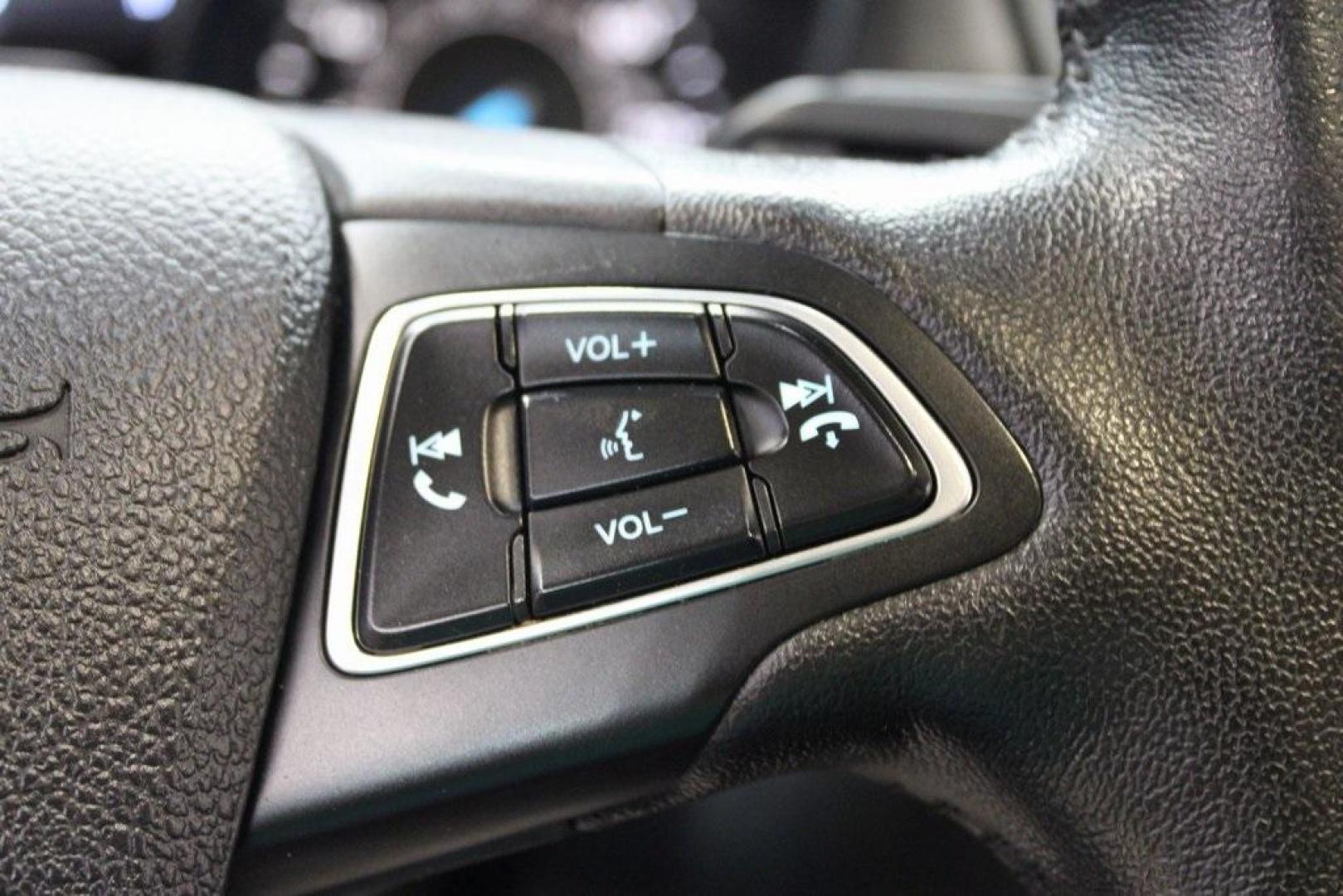 2018 Blue Metallic /Charcoal Black Ford Focus Titanium (1FADP3N28JL) with an 2.0L I4 DGI Ti-VCT engine, Automatic transmission, located at 15300 Midway Rd., Addison, TX, 75001, (972) 702-0011, 32.958321, -96.838074 - Photo#22