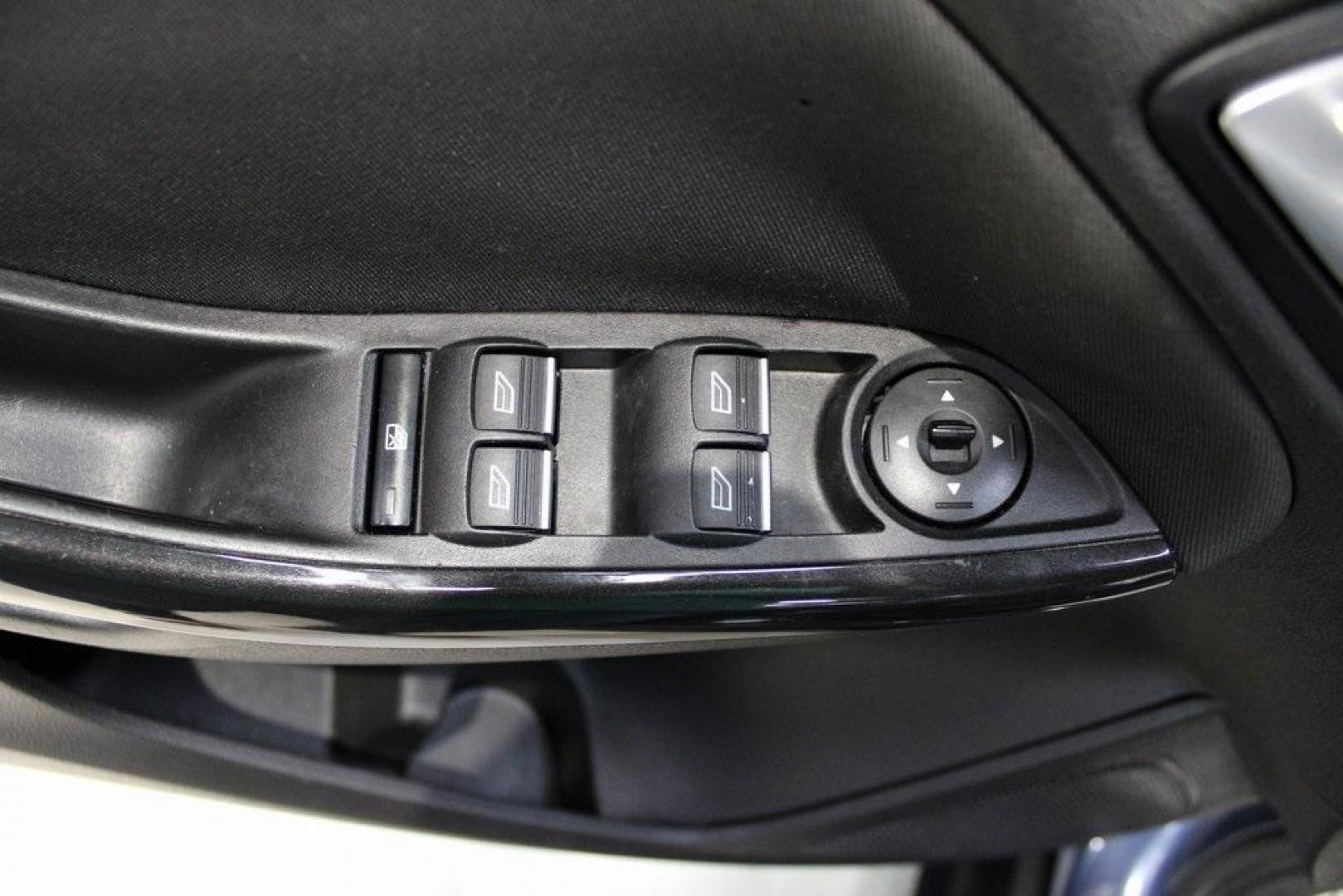 2018 Blue Metallic /Charcoal Black Ford Focus Titanium (1FADP3N28JL) with an 2.0L I4 DGI Ti-VCT engine, Automatic transmission, located at 15300 Midway Rd., Addison, TX, 75001, (972) 702-0011, 32.958321, -96.838074 - Photo#26