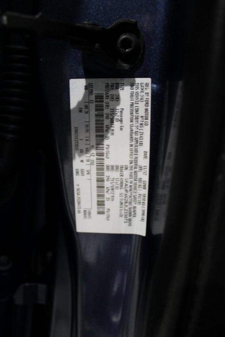 2018 Blue Metallic /Charcoal Black Ford Focus Titanium (1FADP3N28JL) with an 2.0L I4 DGI Ti-VCT engine, Automatic transmission, located at 15300 Midway Rd., Addison, TX, 75001, (972) 702-0011, 32.958321, -96.838074 - Photo#29