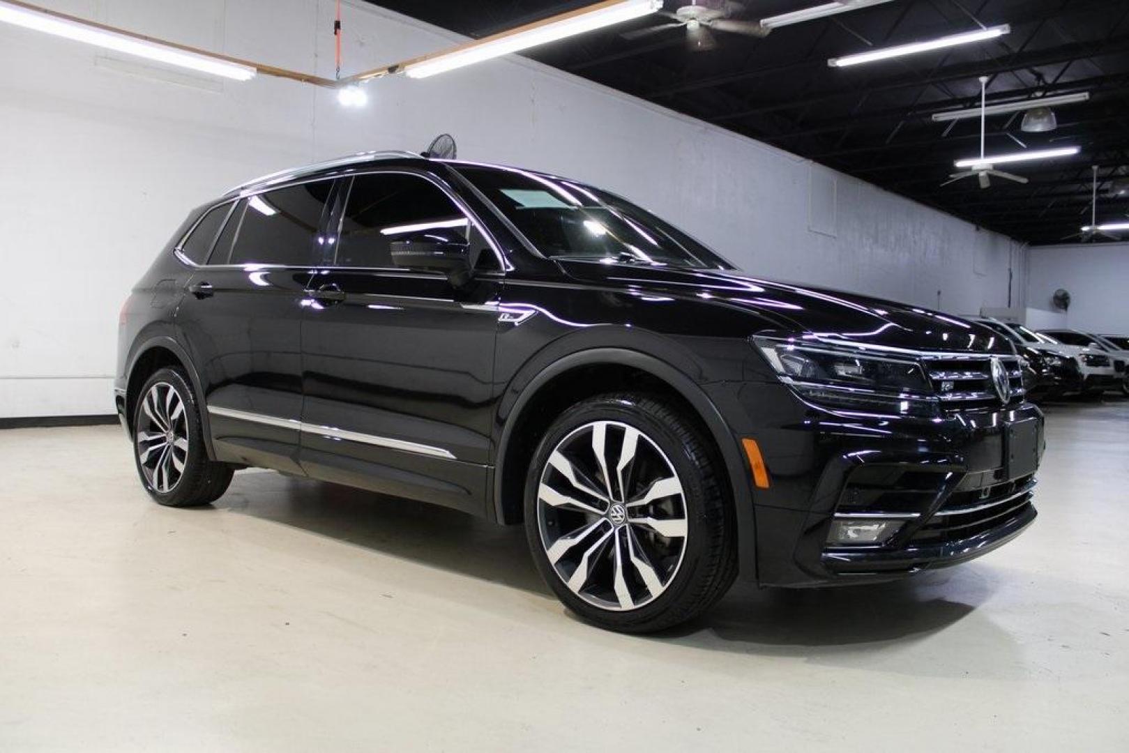 2021 Deep Black Pearl /Saffrano Orange and Black Volkswagen Tiguan 2.0T SEL Premium R-Line (3VV4B7AX4MM) with an 2.0L TSI DOHC engine, Automatic transmission, located at 15300 Midway Rd., Addison, TX, 75001, (972) 702-0011, 32.958321, -96.838074 - Photo#1