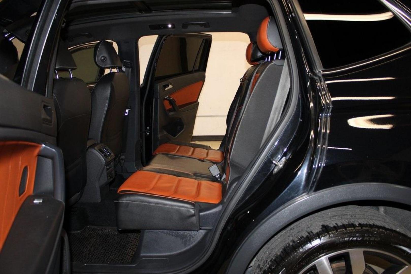 2021 Deep Black Pearl /Saffrano Orange and Black Volkswagen Tiguan 2.0T SEL Premium R-Line (3VV4B7AX4MM) with an 2.0L TSI DOHC engine, Automatic transmission, located at 15300 Midway Rd., Addison, TX, 75001, (972) 702-0011, 32.958321, -96.838074 - Photo#14