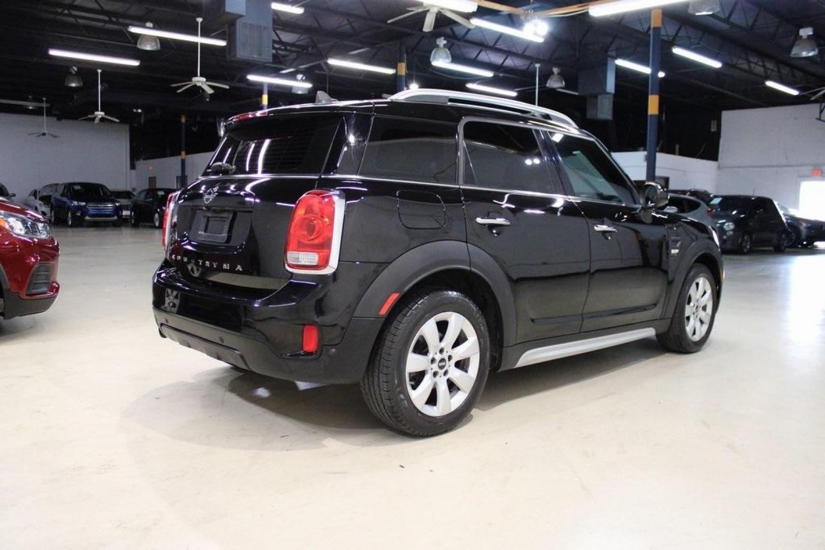 2019 Midnight Black Metallic /Carbon Black MINI Cooper Countryman Iconic (WMZYS7C55K3) with an 1.5L I-3 engine, Automatic transmission, located at 15300 Midway Rd., Addison, TX, 75001, (972) 702-0011, 32.958321, -96.838074 - 2019 MINI Countryman Cooper S ALL4<br>Now Available at Midway Auto Group Addison, Texas<br><br>Blending iconic MINI styling with SUV versatility, the 2019 MINI Countryman Cooper S ALL4 offers a fun-to-drive experience with added space, premium features, and all-wheel drive capability. Whether you'r - Photo#1