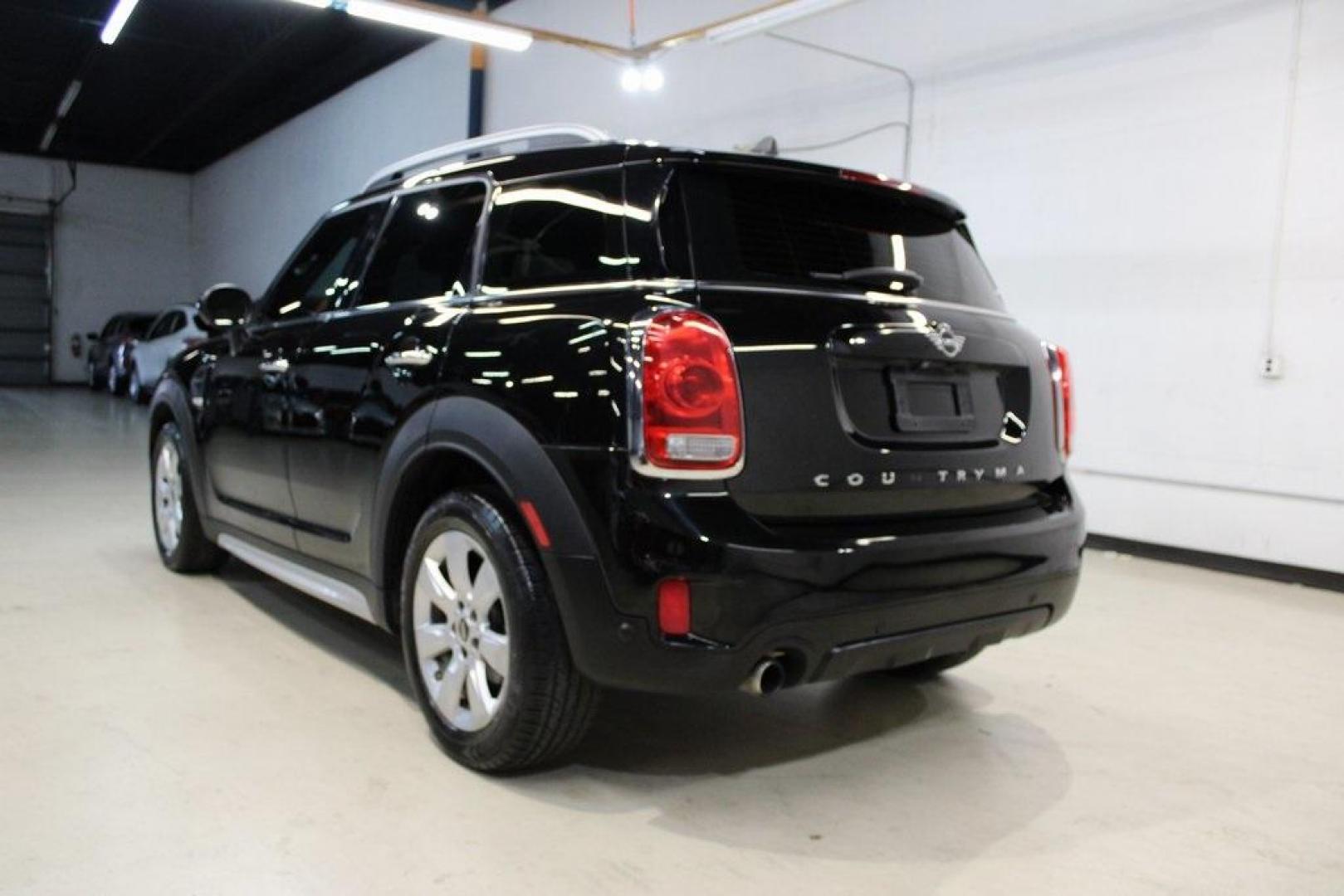 2019 Midnight Black Metallic /Carbon Black MINI Cooper Countryman Iconic (WMZYS7C55K3) with an 1.5L I-3 engine, Automatic transmission, located at 15300 Midway Rd., Addison, TX, 75001, (972) 702-0011, 32.958321, -96.838074 - 2019 MINI Countryman Cooper S ALL4<br>Now Available at Midway Auto Group Addison, Texas<br><br>Blending iconic MINI styling with SUV versatility, the 2019 MINI Countryman Cooper S ALL4 offers a fun-to-drive experience with added space, premium features, and all-wheel drive capability. Whether you'r - Photo#2
