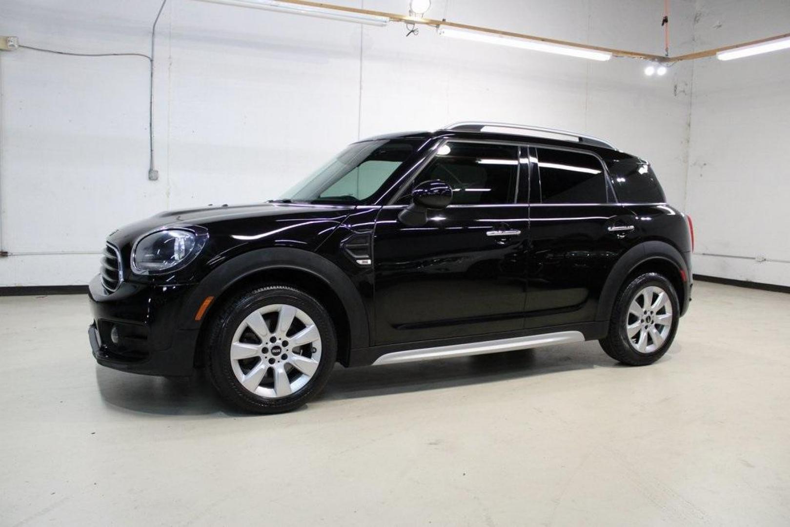2019 Midnight Black Metallic /Carbon Black MINI Cooper Countryman Iconic (WMZYS7C55K3) with an 1.5L I-3 engine, Automatic transmission, located at 15300 Midway Rd., Addison, TX, 75001, (972) 702-0011, 32.958321, -96.838074 - 2019 MINI Countryman Cooper S ALL4<br>Now Available at Midway Auto Group Addison, Texas<br><br>Blending iconic MINI styling with SUV versatility, the 2019 MINI Countryman Cooper S ALL4 offers a fun-to-drive experience with added space, premium features, and all-wheel drive capability. Whether you'r - Photo#3