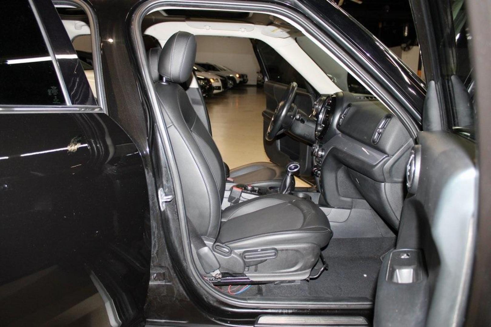 2019 Midnight Black Metallic /Carbon Black MINI Cooper Countryman Iconic (WMZYS7C55K3) with an 1.5L I-3 engine, Automatic transmission, located at 15300 Midway Rd., Addison, TX, 75001, (972) 702-0011, 32.958321, -96.838074 - 2019 MINI Countryman Cooper S ALL4<br>Now Available at Midway Auto Group Addison, Texas<br><br>Blending iconic MINI styling with SUV versatility, the 2019 MINI Countryman Cooper S ALL4 offers a fun-to-drive experience with added space, premium features, and all-wheel drive capability. Whether you'r - Photo#12