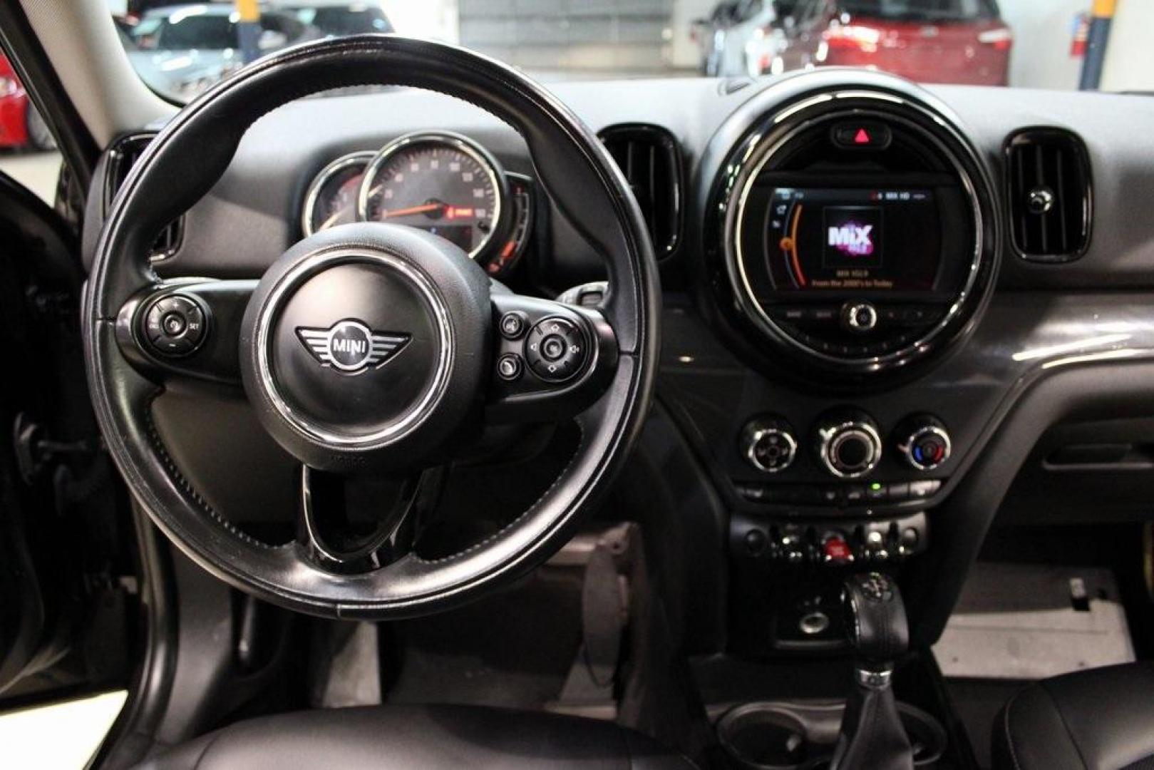 2019 Midnight Black Metallic /Carbon Black MINI Cooper Countryman Iconic (WMZYS7C55K3) with an 1.5L I-3 engine, Automatic transmission, located at 15300 Midway Rd., Addison, TX, 75001, (972) 702-0011, 32.958321, -96.838074 - 2019 MINI Countryman Cooper S ALL4<br>Now Available at Midway Auto Group Addison, Texas<br><br>Blending iconic MINI styling with SUV versatility, the 2019 MINI Countryman Cooper S ALL4 offers a fun-to-drive experience with added space, premium features, and all-wheel drive capability. Whether you'r - Photo#15