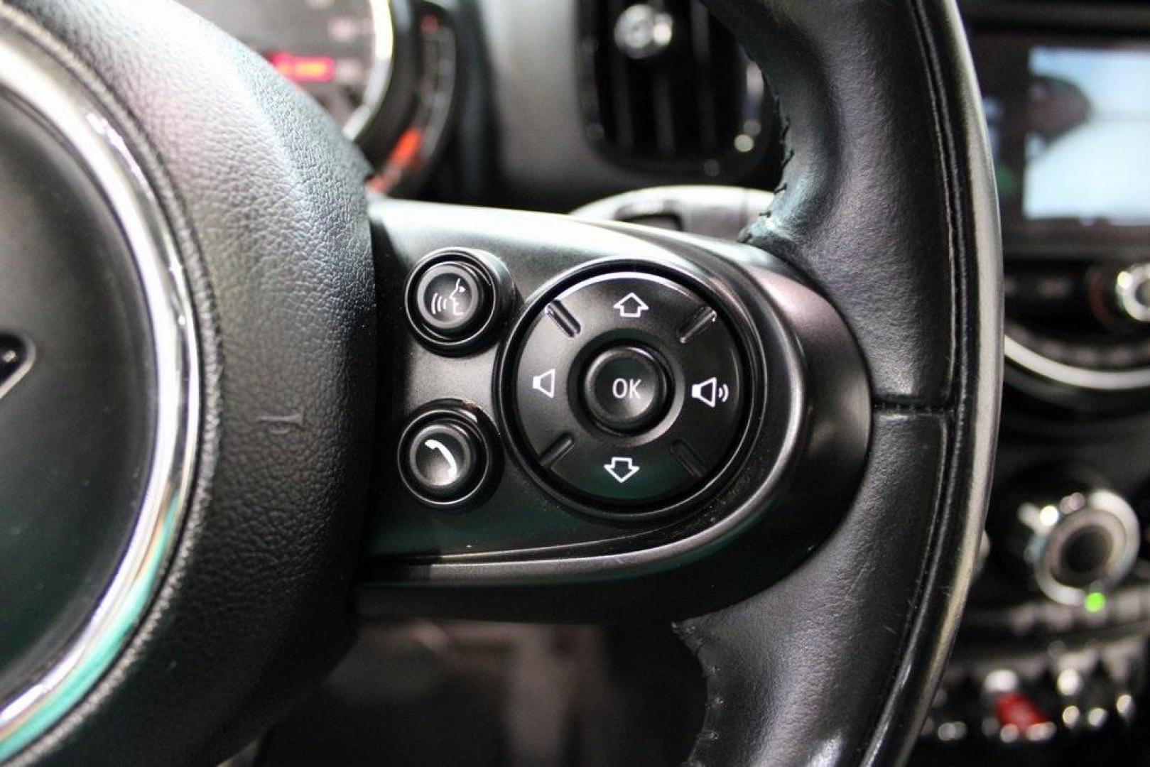2019 Midnight Black Metallic /Carbon Black MINI Cooper Countryman Iconic (WMZYS7C55K3) with an 1.5L I-3 engine, Automatic transmission, located at 15300 Midway Rd., Addison, TX, 75001, (972) 702-0011, 32.958321, -96.838074 - 2019 MINI Countryman Cooper S ALL4<br>Now Available at Midway Auto Group Addison, Texas<br><br>Blending iconic MINI styling with SUV versatility, the 2019 MINI Countryman Cooper S ALL4 offers a fun-to-drive experience with added space, premium features, and all-wheel drive capability. Whether you'r - Photo#21
