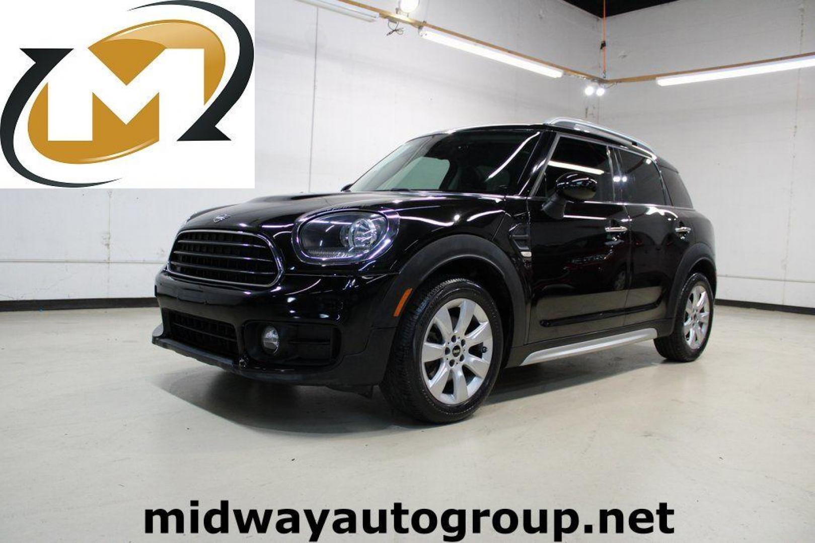 2019 Midnight Black Metallic /Carbon Black MINI Cooper Countryman Signature (WMZYS7C55K3) with an 1.5L I-3 engine, Automatic transmission, located at 15300 Midway Rd., Addison, TX, 75001, (972) 702-0011, 32.958321, -96.838074 - 2019 MINI Countryman Cooper S ALL4<br>Now Available at Midway Auto Group Addison, Texas<br><br>Blending iconic MINI styling with SUV versatility, the 2019 MINI Countryman Cooper S ALL4 offers a fun-to-drive experience with added space, premium features, and all-wheel drive capability. Whether you'r - Photo#0