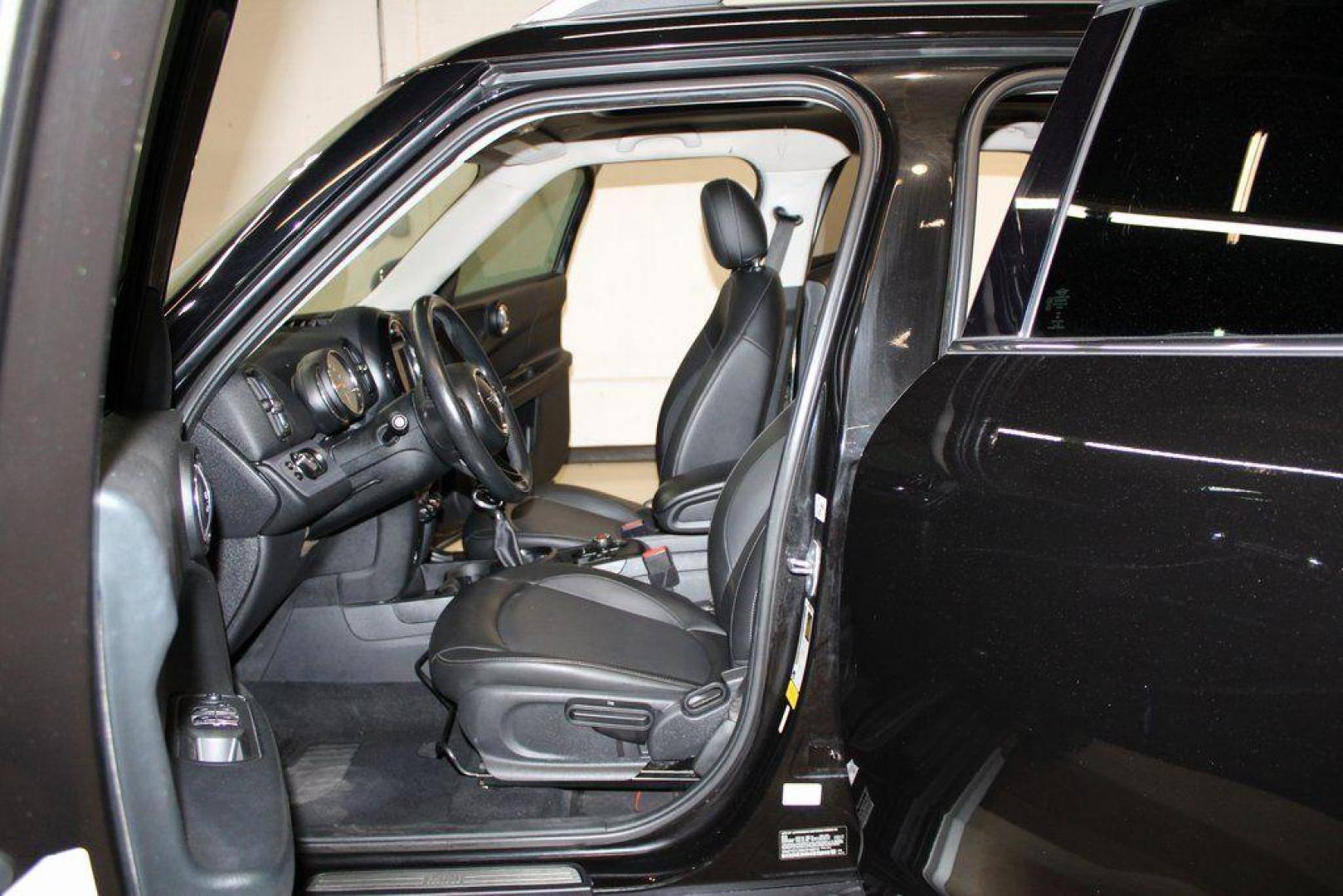 2019 Midnight Black Metallic /Carbon Black MINI Cooper Countryman Signature (WMZYS7C55K3) with an 1.5L I-3 engine, Automatic transmission, located at 15300 Midway Rd., Addison, TX, 75001, (972) 702-0011, 32.958321, -96.838074 - 2019 MINI Countryman Cooper S ALL4<br>Now Available at Midway Auto Group Addison, Texas<br><br>Blending iconic MINI styling with SUV versatility, the 2019 MINI Countryman Cooper S ALL4 offers a fun-to-drive experience with added space, premium features, and all-wheel drive capability. Whether you'r - Photo#11