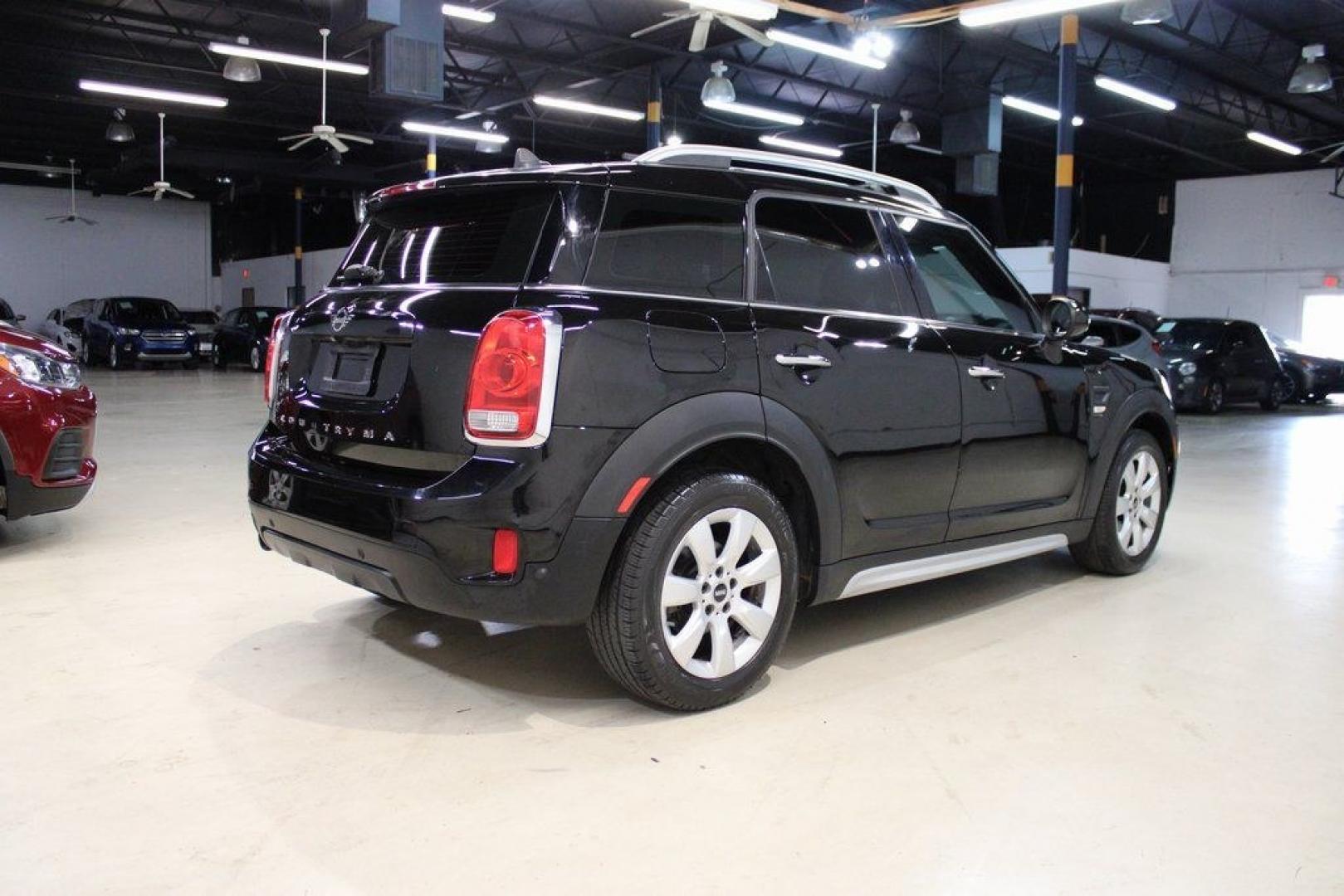 2019 Midnight Black Metallic /Carbon Black MINI Cooper Countryman Classic (WMZYS7C55K3) with an 1.5L I-3 engine, Automatic transmission, located at 15300 Midway Rd., Addison, TX, 75001, (972) 702-0011, 32.958321, -96.838074 - 2019 MINI Countryman Cooper S ALL4<br>Now Available at Midway Auto Group Addison, Texas<br><br>Blending iconic MINI styling with SUV versatility, the 2019 MINI Countryman Cooper S ALL4 offers a fun-to-drive experience with added space, premium features, and all-wheel drive capability. Whether you'r- Photo#1