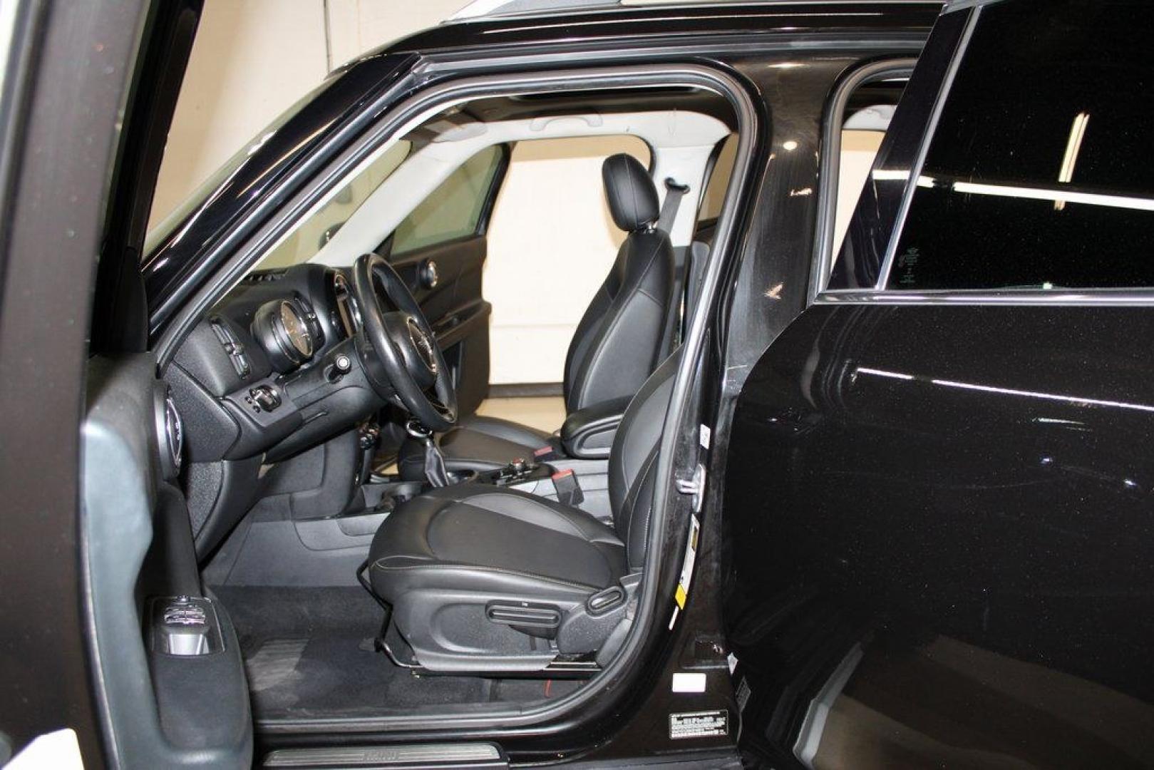 2019 Midnight Black Metallic /Carbon Black MINI Cooper Countryman Classic (WMZYS7C55K3) with an 1.5L I-3 engine, Automatic transmission, located at 15300 Midway Rd., Addison, TX, 75001, (972) 702-0011, 32.958321, -96.838074 - 2019 MINI Countryman Cooper S ALL4<br>Now Available at Midway Auto Group Addison, Texas<br><br>Blending iconic MINI styling with SUV versatility, the 2019 MINI Countryman Cooper S ALL4 offers a fun-to-drive experience with added space, premium features, and all-wheel drive capability. Whether you'r- Photo#11
