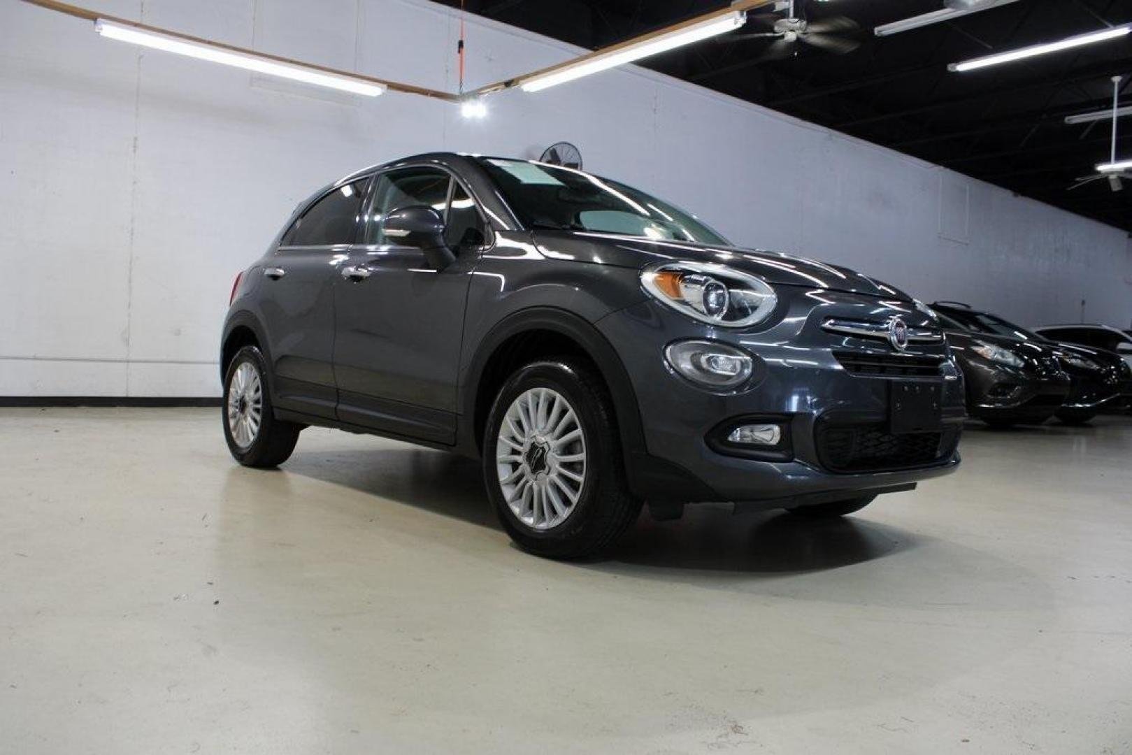 2017 Grigio Graphite (Graphite Gray) /Lt Pebble Beige/Dk Slate Fiat 500X Lounge (ZFBCFYDB3HP) with an 2.4L I4 MultiAir engine, Automatic transmission, located at 15300 Midway Rd., Addison, TX, 75001, (972) 702-0011, 32.958321, -96.838074 - 2017 FIAT 500L Trekking<br>Now Available at Midway Auto Group Addison, Texas<br><br>Stand out from the crowd with the bold styling, roomy interior, and European flair of the 2017 FIAT 500L Trekking. This uniquely designed crossover blends urban-friendly dimensions with SUV-like practicality, offeri - Photo#1
