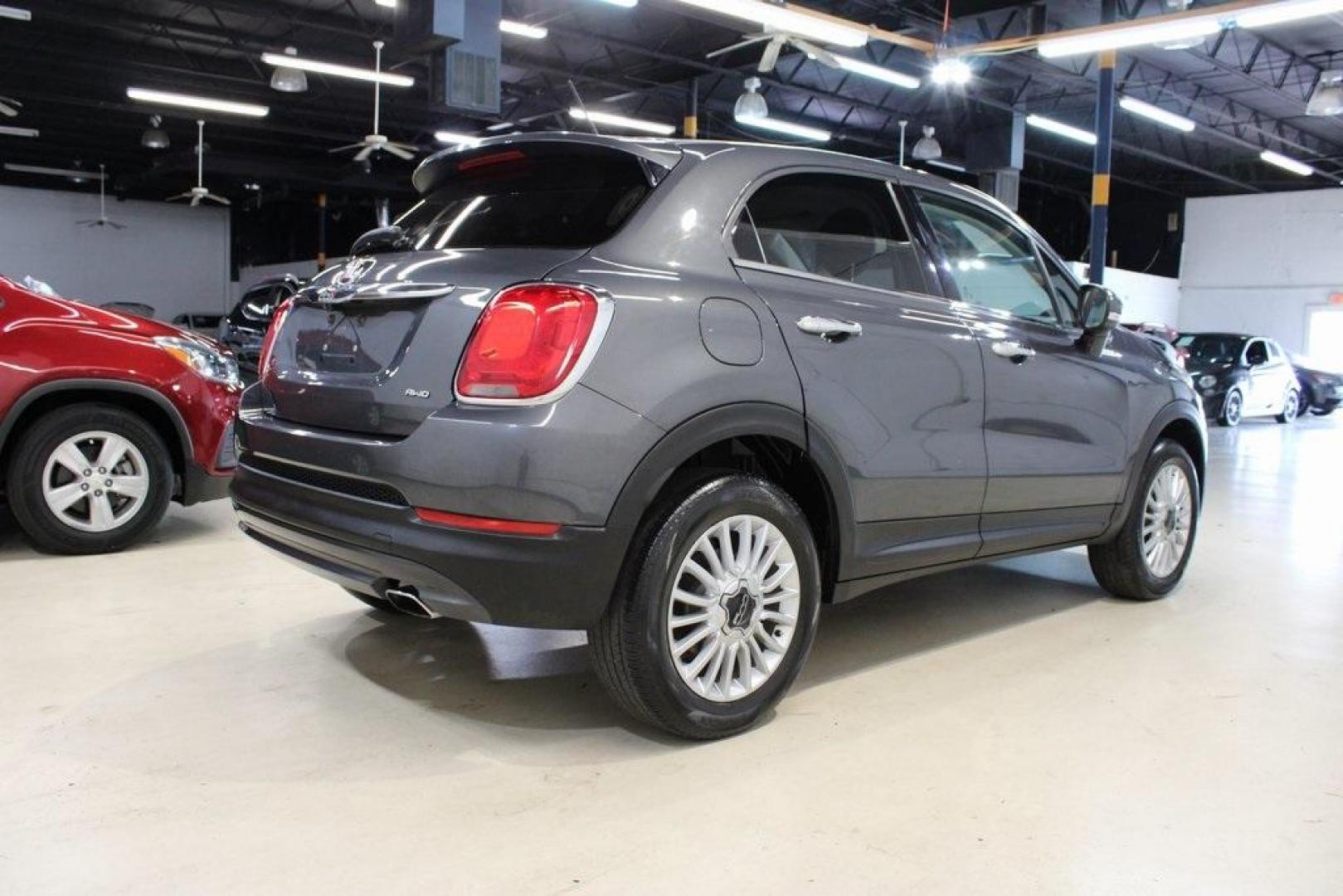 2017 Grigio Graphite (Graphite Gray) /Lt Pebble Beige/Dk Slate Fiat 500X Lounge (ZFBCFYDB3HP) with an 2.4L I4 MultiAir engine, Automatic transmission, located at 15300 Midway Rd., Addison, TX, 75001, (972) 702-0011, 32.958321, -96.838074 - 2017 FIAT 500L Trekking<br>Now Available at Midway Auto Group Addison, Texas<br><br>Stand out from the crowd with the bold styling, roomy interior, and European flair of the 2017 FIAT 500L Trekking. This uniquely designed crossover blends urban-friendly dimensions with SUV-like practicality, offeri - Photo#2