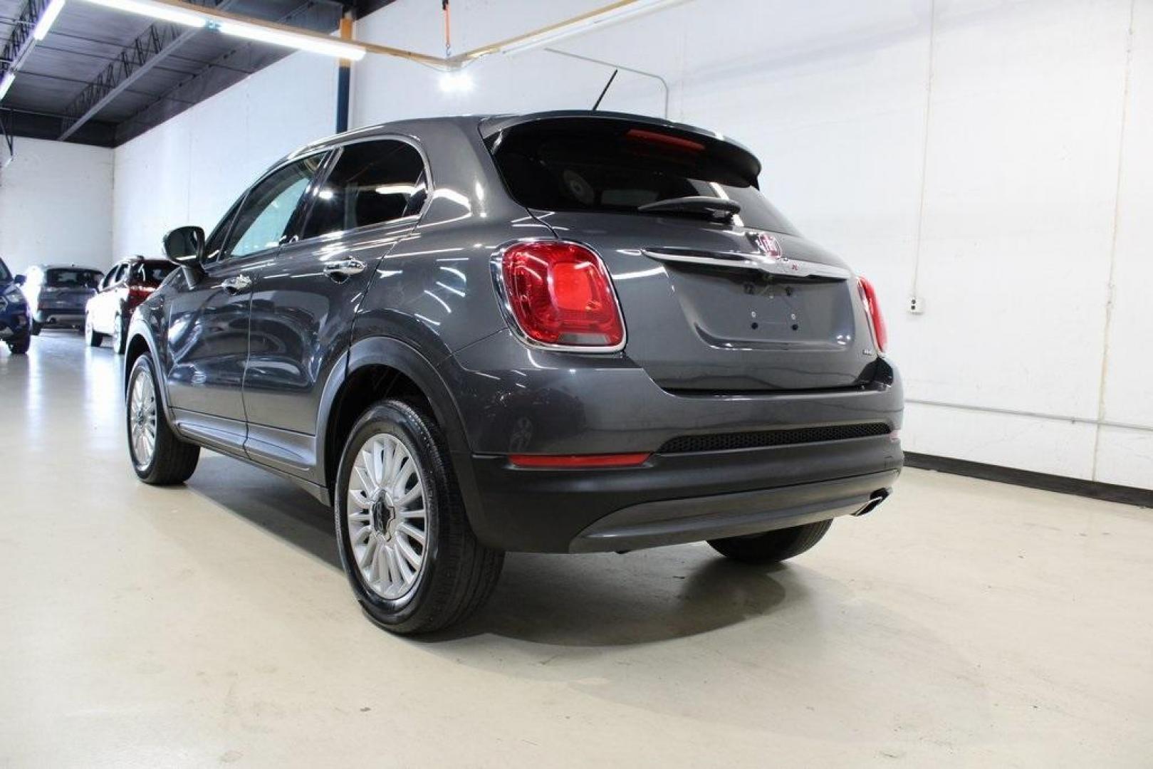 2017 Grigio Graphite (Graphite Gray) /Lt Pebble Beige/Dk Slate Fiat 500X Lounge (ZFBCFYDB3HP) with an 2.4L I4 MultiAir engine, Automatic transmission, located at 15300 Midway Rd., Addison, TX, 75001, (972) 702-0011, 32.958321, -96.838074 - 2017 FIAT 500L Trekking<br>Now Available at Midway Auto Group Addison, Texas<br><br>Stand out from the crowd with the bold styling, roomy interior, and European flair of the 2017 FIAT 500L Trekking. This uniquely designed crossover blends urban-friendly dimensions with SUV-like practicality, offeri - Photo#3