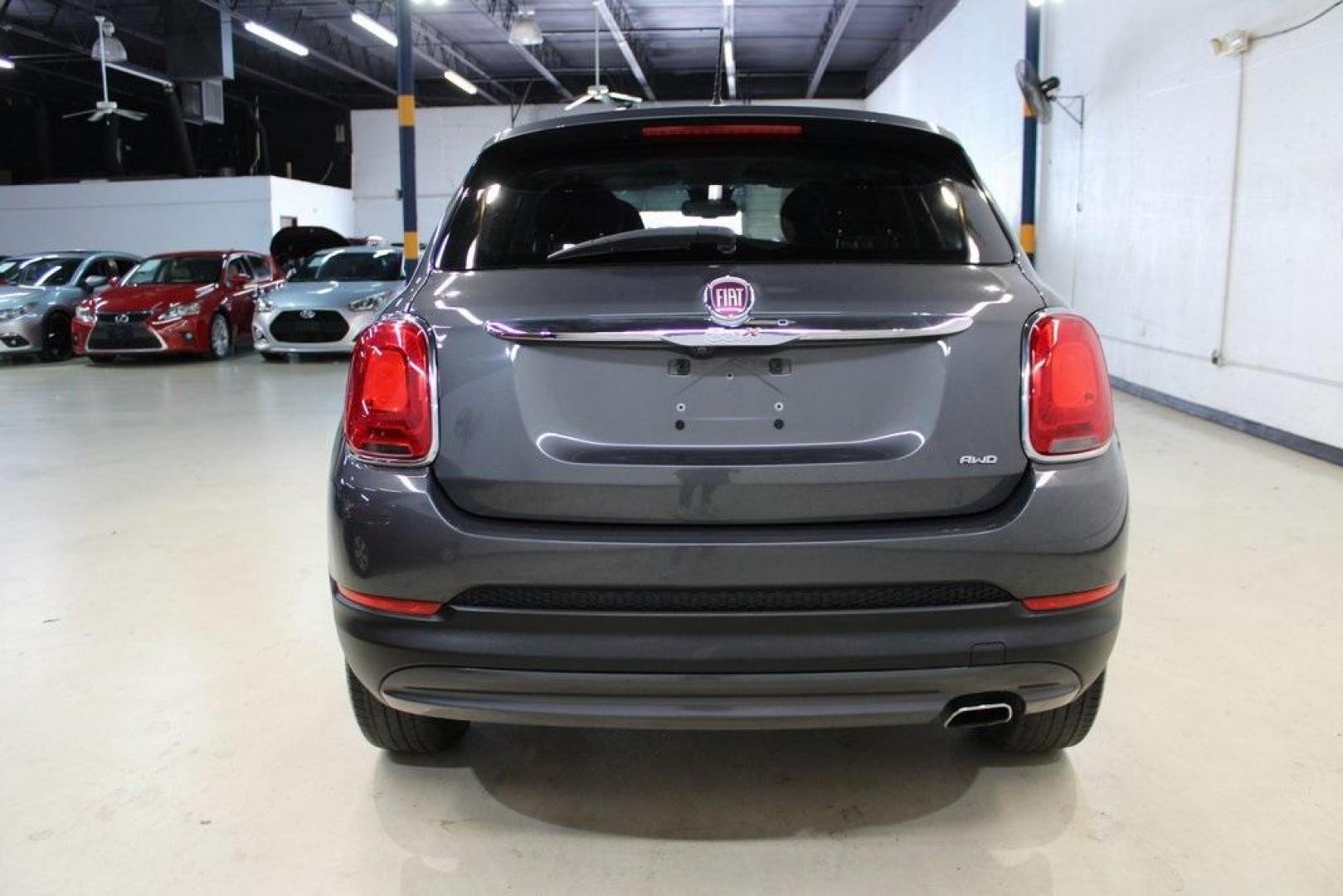 2017 Grigio Graphite (Graphite Gray) /Lt Pebble Beige/Dk Slate Fiat 500X Lounge (ZFBCFYDB3HP) with an 2.4L I4 MultiAir engine, Automatic transmission, located at 15300 Midway Rd., Addison, TX, 75001, (972) 702-0011, 32.958321, -96.838074 - 2017 FIAT 500L Trekking<br>Now Available at Midway Auto Group Addison, Texas<br><br>Stand out from the crowd with the bold styling, roomy interior, and European flair of the 2017 FIAT 500L Trekking. This uniquely designed crossover blends urban-friendly dimensions with SUV-like practicality, offeri - Photo#7