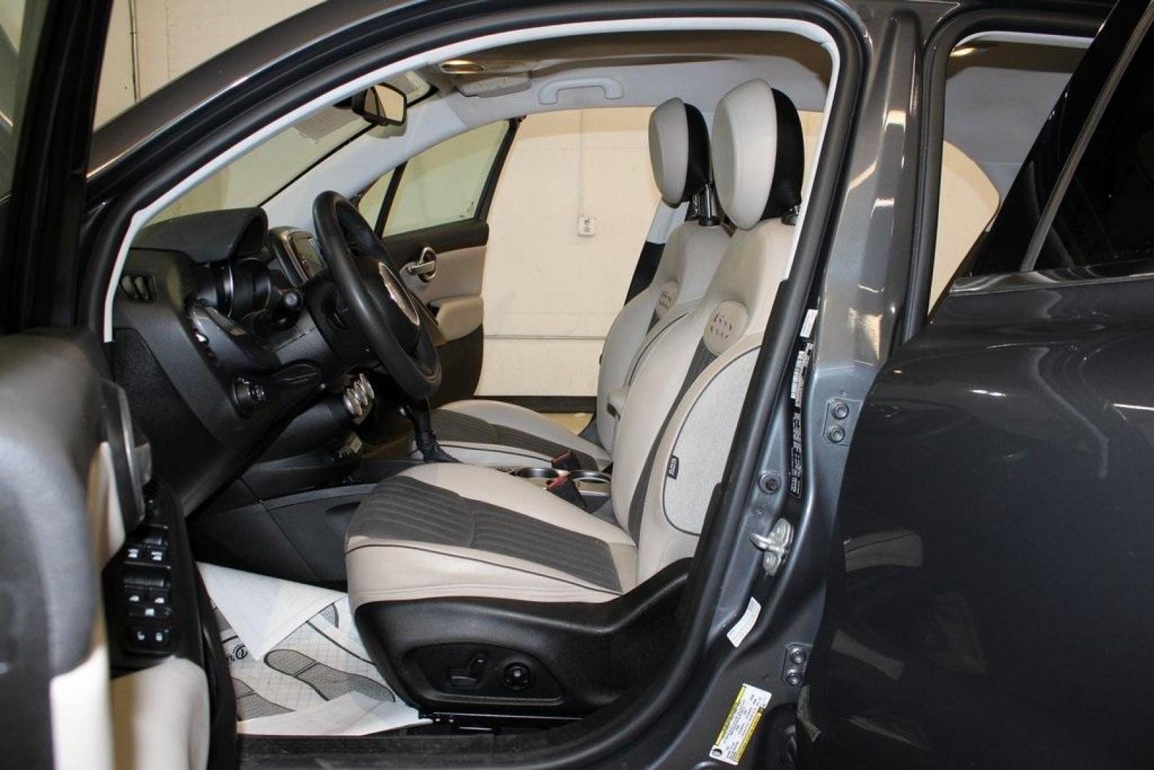 2017 Grigio Graphite (Graphite Gray) /Lt Pebble Beige/Dk Slate Fiat 500X Lounge (ZFBCFYDB3HP) with an 2.4L I4 MultiAir engine, Automatic transmission, located at 15300 Midway Rd., Addison, TX, 75001, (972) 702-0011, 32.958321, -96.838074 - 2017 FIAT 500L Trekking<br>Now Available at Midway Auto Group Addison, Texas<br><br>Stand out from the crowd with the bold styling, roomy interior, and European flair of the 2017 FIAT 500L Trekking. This uniquely designed crossover blends urban-friendly dimensions with SUV-like practicality, offeri - Photo#12