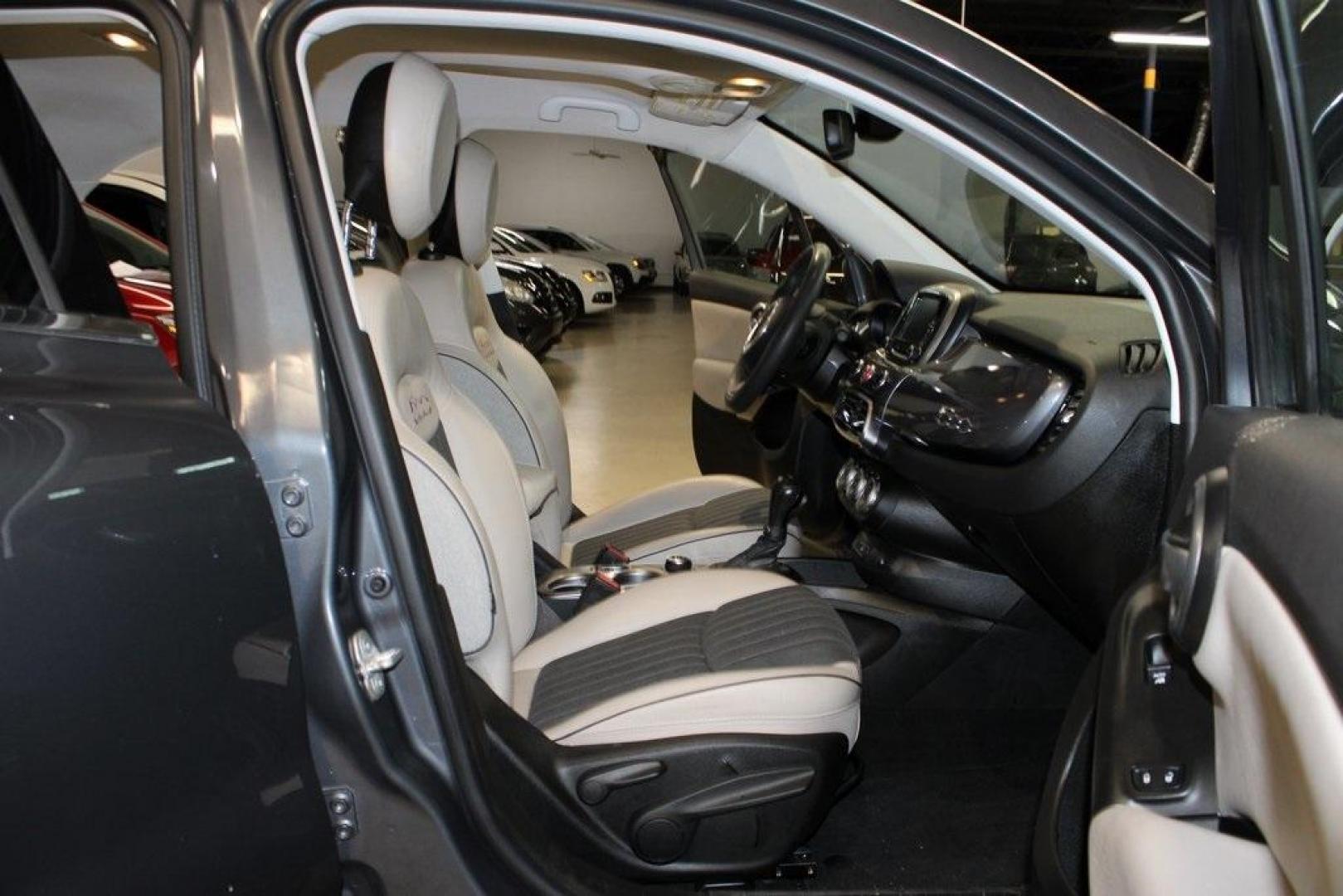 2017 Grigio Graphite (Graphite Gray) /Lt Pebble Beige/Dk Slate Fiat 500X Lounge (ZFBCFYDB3HP) with an 2.4L I4 MultiAir engine, Automatic transmission, located at 15300 Midway Rd., Addison, TX, 75001, (972) 702-0011, 32.958321, -96.838074 - 2017 FIAT 500L Trekking<br>Now Available at Midway Auto Group Addison, Texas<br><br>Stand out from the crowd with the bold styling, roomy interior, and European flair of the 2017 FIAT 500L Trekking. This uniquely designed crossover blends urban-friendly dimensions with SUV-like practicality, offeri - Photo#13