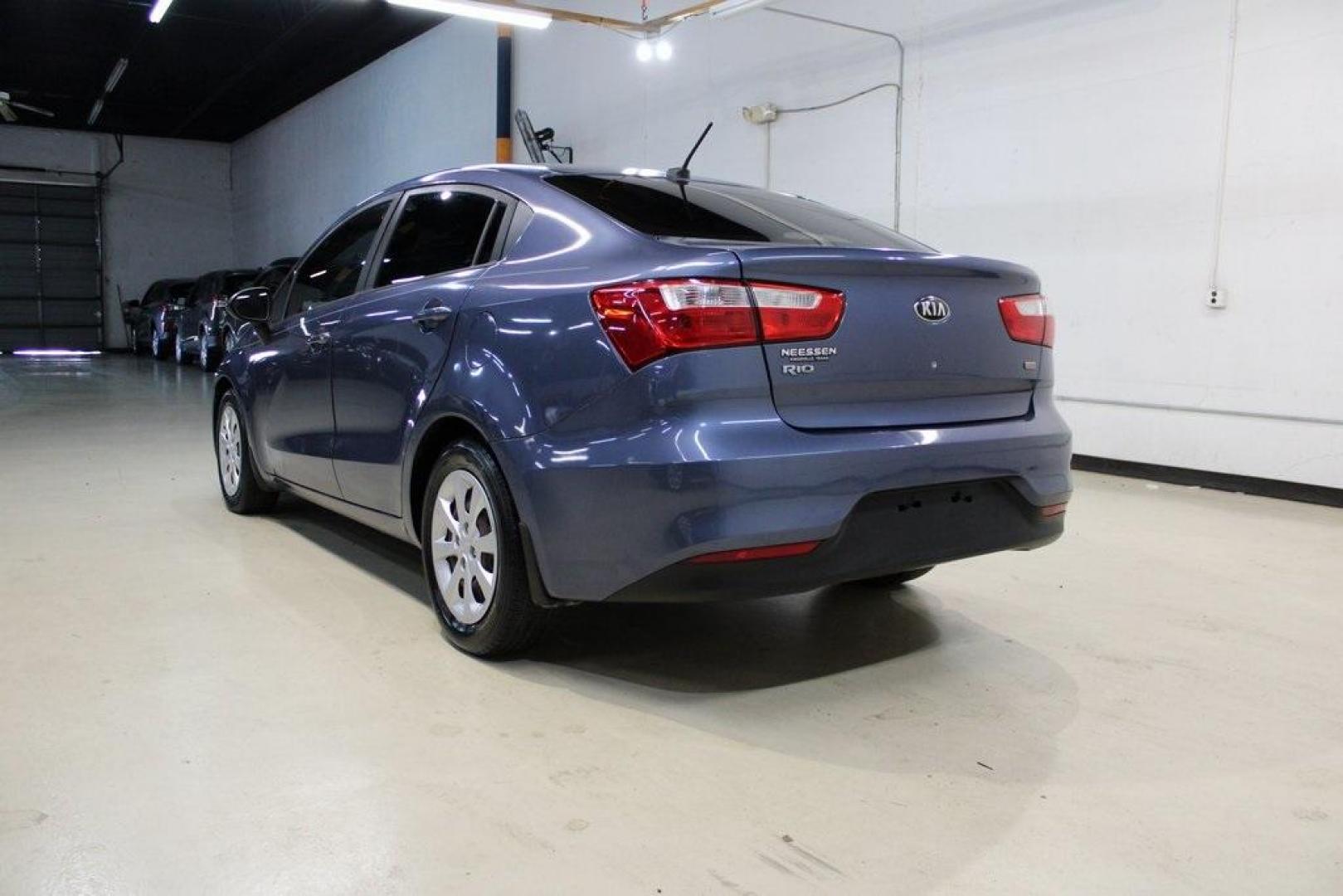 2016 Urban Blue Pearl Metallic /Black Kia Rio LX (KNADM4A30G6) with an 1.6L I4 DGI 16V engine, Automatic transmission, located at 15300 Midway Rd., Addison, TX, 75001, (972) 702-0011, 32.958321, -96.838074 - 2016 Kia Rio LX<br>Now Available at Midway Auto Group Addison, Texas<br><br>Efficient, reliable, and easy to drivethe 2016 Kia Rio LX is a smart choice for anyone seeking affordable transportation without sacrificing comfort or style. With its compact size, strong fuel economy, and solid build qual - Photo#3