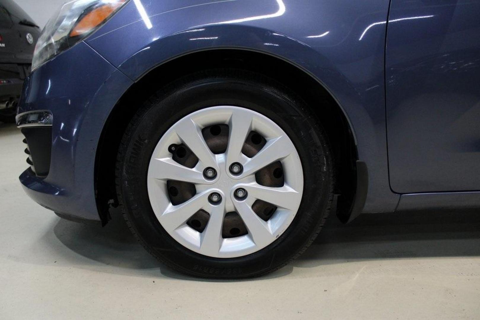 2016 Urban Blue Pearl Metallic /Black Kia Rio LX (KNADM4A30G6) with an 1.6L I4 DGI 16V engine, Automatic transmission, located at 15300 Midway Rd., Addison, TX, 75001, (972) 702-0011, 32.958321, -96.838074 - 2016 Kia Rio LX<br>Now Available at Midway Auto Group Addison, Texas<br><br>Efficient, reliable, and easy to drivethe 2016 Kia Rio LX is a smart choice for anyone seeking affordable transportation without sacrificing comfort or style. With its compact size, strong fuel economy, and solid build qual - Photo#7