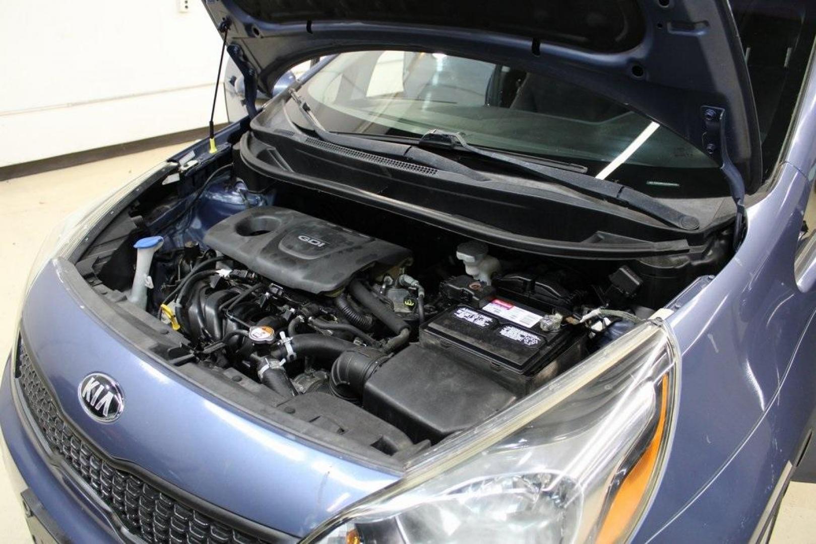 2016 Urban Blue Pearl Metallic /Black Kia Rio LX (KNADM4A30G6) with an 1.6L I4 DGI 16V engine, Automatic transmission, located at 15300 Midway Rd., Addison, TX, 75001, (972) 702-0011, 32.958321, -96.838074 - 2016 Kia Rio LX<br>Now Available at Midway Auto Group Addison, Texas<br><br>Efficient, reliable, and easy to drivethe 2016 Kia Rio LX is a smart choice for anyone seeking affordable transportation without sacrificing comfort or style. With its compact size, strong fuel economy, and solid build qual - Photo#20