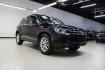 2017 Deep Black /Charcoal Black Volkswagen Tiguan 2.0T Wolfsburg Edition (WVGRV7AX4HK) with an 2.0L TSI DOHC engine, Automatic transmission, located at 15300 Midway Rd., Addison, TX, 75001, (972) 702-0011, 32.958321, -96.838074 - 2017 Volkswagen Touareg V6 Wolfsburg Edition<br>Now Available at Midway Auto Group Addison, Texas<br><br>Premium, powerful, and well-equipped, the 2017 Volkswagen Touareg Wolfsburg Edition delivers luxury SUV refinement with German-engineered performance. With a smooth V6 engine, a richly appointed - Photo#1