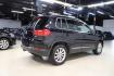 2017 Deep Black /Charcoal Black Volkswagen Tiguan 2.0T Wolfsburg Edition (WVGRV7AX4HK) with an 2.0L TSI DOHC engine, Automatic transmission, located at 15300 Midway Rd., Addison, TX, 75001, (972) 702-0011, 32.958321, -96.838074 - 2017 Volkswagen Touareg V6 Wolfsburg Edition<br>Now Available at Midway Auto Group Addison, Texas<br><br>Premium, powerful, and well-equipped, the 2017 Volkswagen Touareg Wolfsburg Edition delivers luxury SUV refinement with German-engineered performance. With a smooth V6 engine, a richly appointed - Photo#2